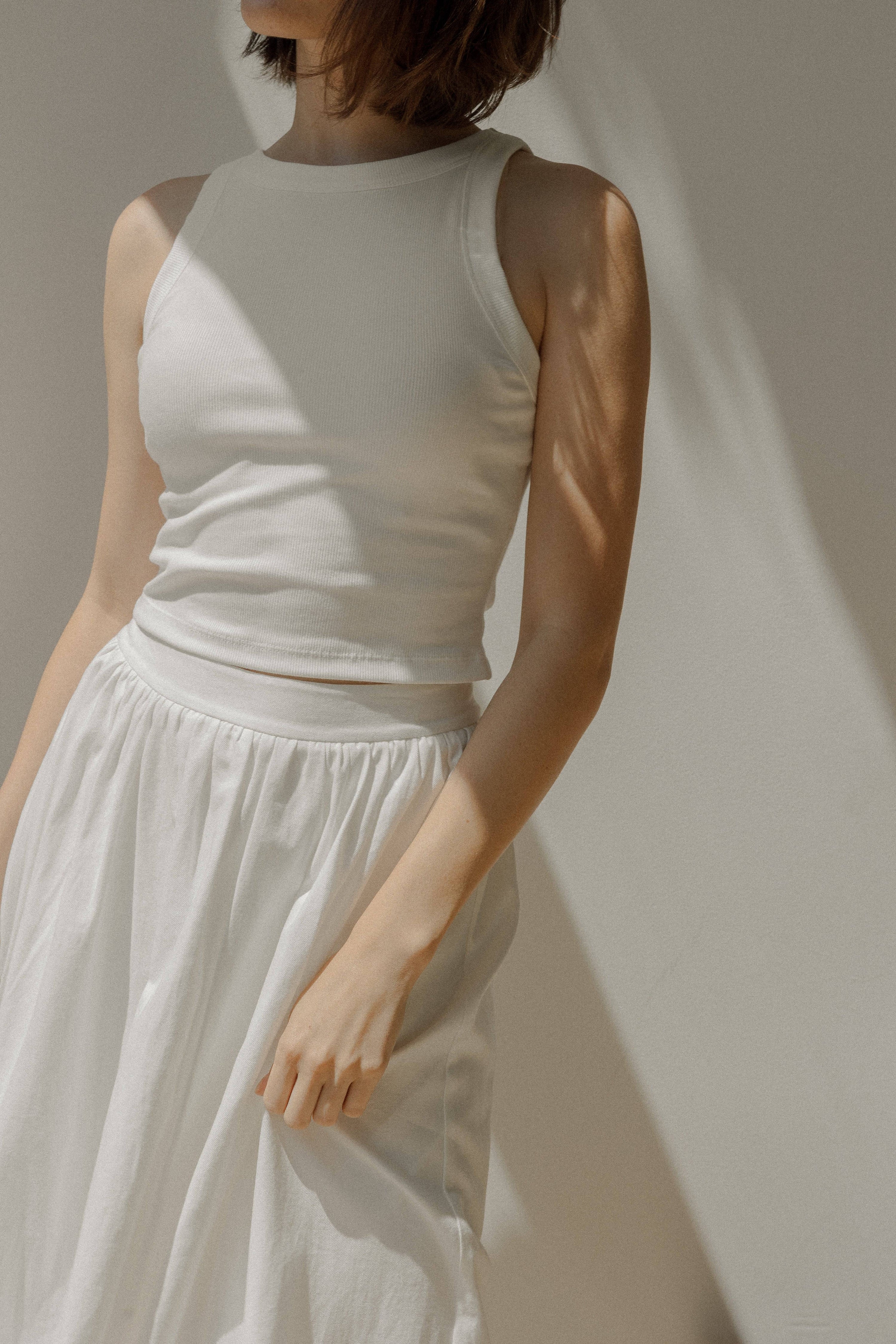 8169757147357, The Tonya Top, Tops, Mod Ref, Basic,Basics,Blush,cf-color-black,cf-color-blush,cf-color-olive,cf-size-l,cf-size-m,cf-size-s,cf-vendor-mod-ref,Cotton,Crop,Crop Top,Cropped,essentials,Everyday,final-sale,finalsale,layering,Layers,Olive,racerback,Rib,Ribbed,Ribbed Fabric,Ribbed Top,Ribbing,sale,tank,Tank Top, Information The Tonya Top is a basic cropped ribbed tank top. Crafted from a rayon-cotton-spandex blend, this racerback tank top is a versatile piece for your daily wardrobe. Perfect for pa