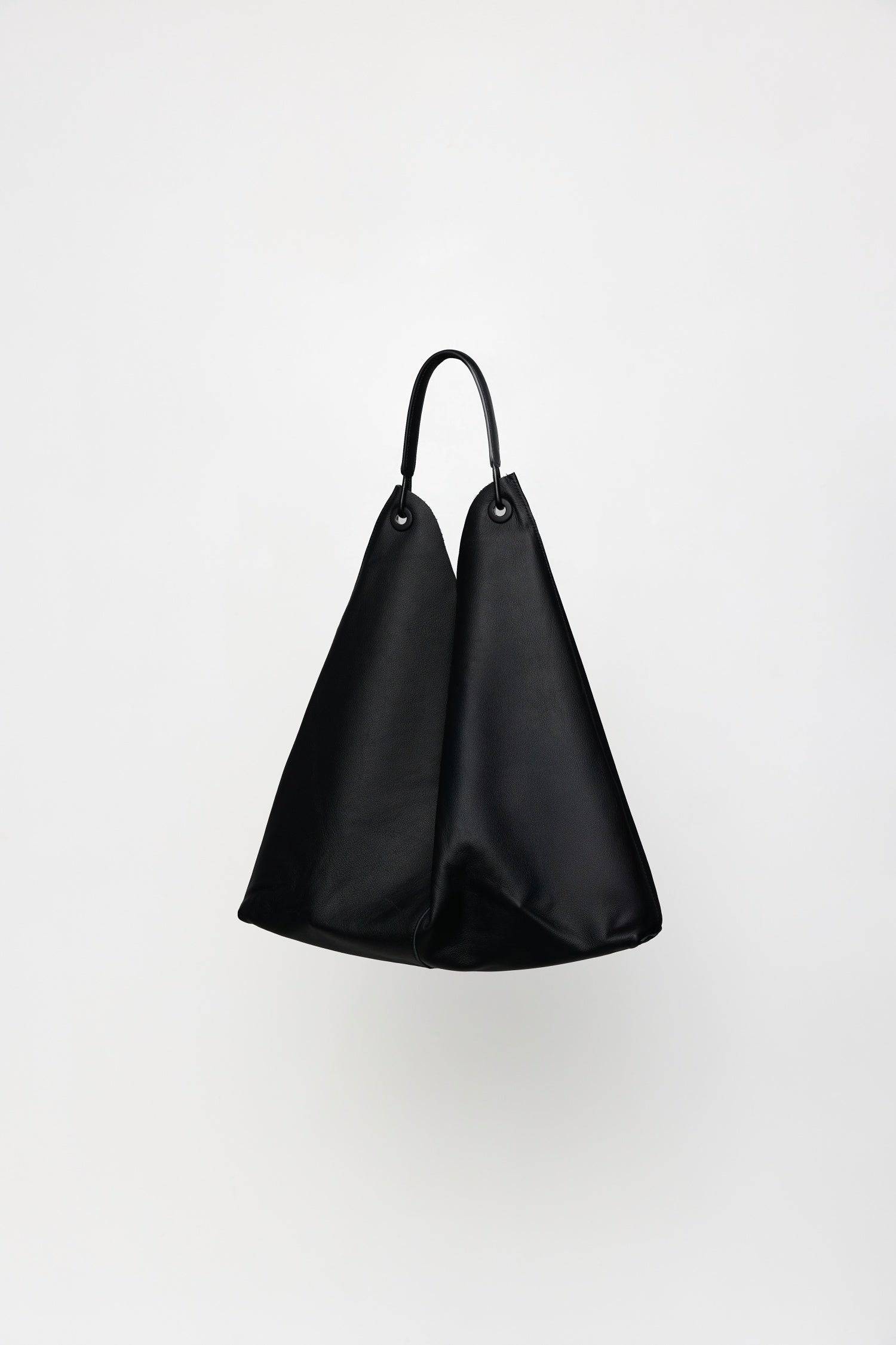 8857790644445, The Kenzie Bindle Bag, Bags, Mod Ref | Common Market, accessories,bag,bags,cf-color-khaki,cf-color-white,cf-vendor-mod-ref-common-market,dark brown,modrefcommonmarket,Oversized,purse, Information The Kenzie Bindle Bag is a spacious, oversized shoulder bag crafted from 100% cowhide combining lasting durability with a refined, natural texture. Designed for both style and practicality, it features an open top for easy access, a secure interior zipper pocket, and a soft suede lining for a touch o