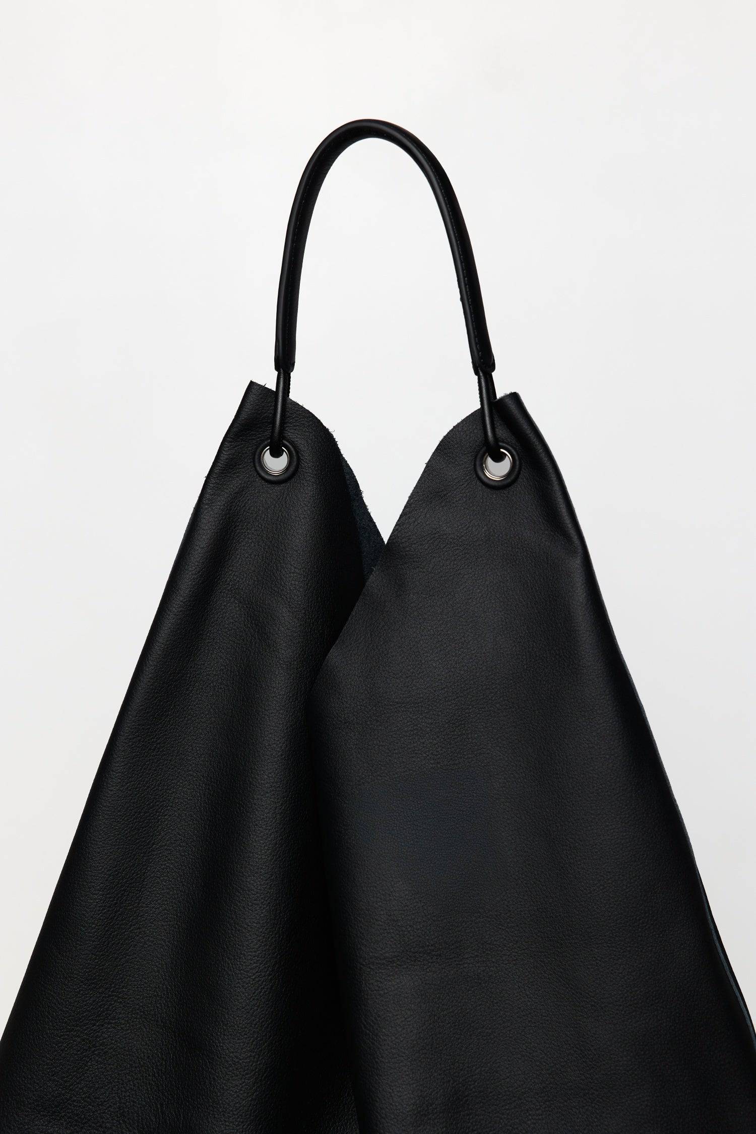 8857790644445, The Kenzie Bindle Bag, Bags, Mod Ref | Common Market, accessories,bag,bags,cf-color-khaki,cf-color-white,cf-vendor-mod-ref-common-market,dark brown,modrefcommonmarket,Oversized,purse, Information The Kenzie Bindle Bag is a spacious, oversized shoulder bag crafted from 100% cowhide combining lasting durability with a refined, natural texture. Designed for both style and practicality, it features an open top for easy access, a secure interior zipper pocket, and a soft suede lining for a touch o