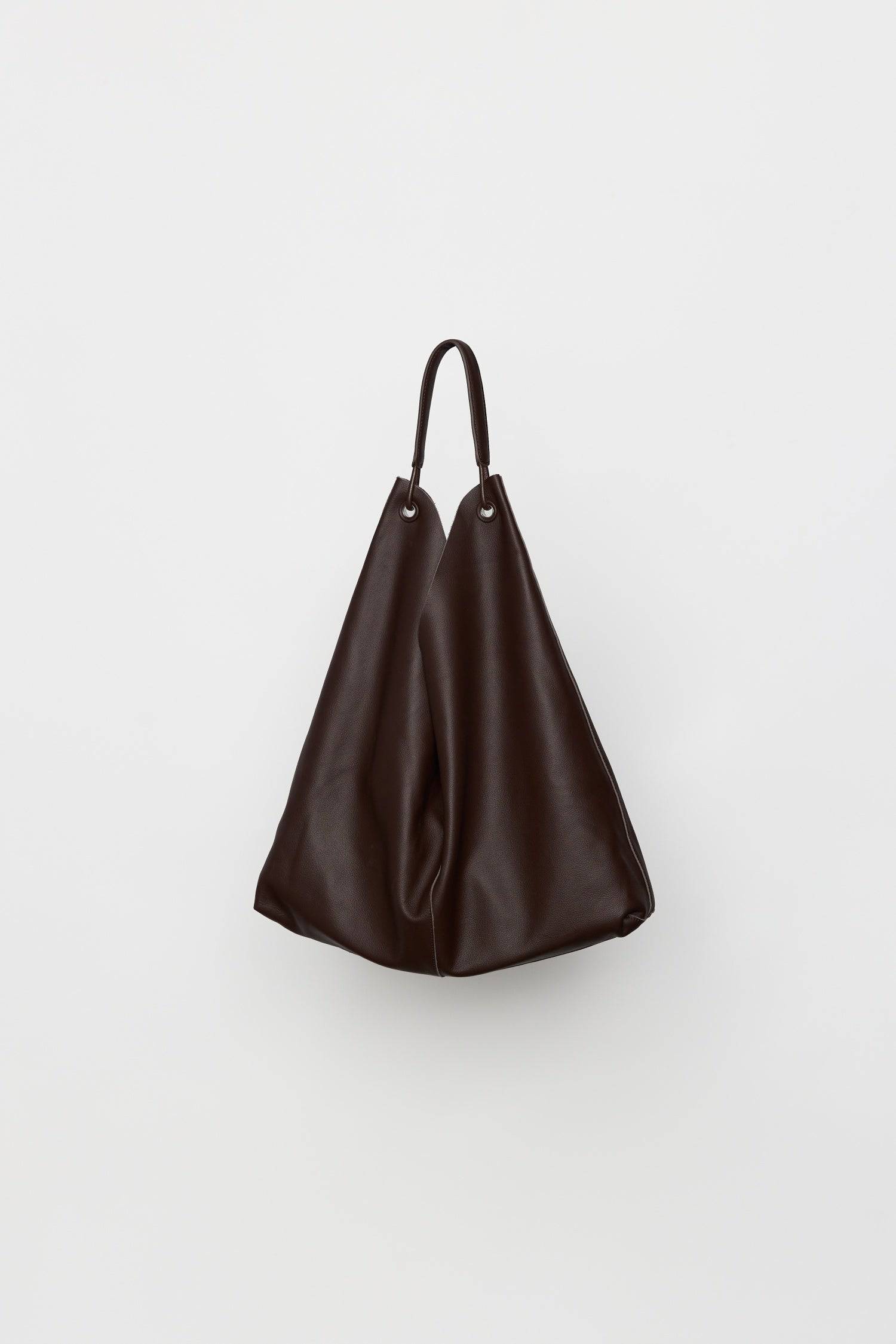 8857790644445, The Kenzie Bindle Bag, Bags, Mod Ref | Common Market, accessories,bag,bags,cf-color-khaki,cf-color-white,cf-vendor-mod-ref-common-market,dark brown,modrefcommonmarket,Oversized,purse, Information The Kenzie Bindle Bag is a spacious, oversized shoulder bag crafted from 100% cowhide combining lasting durability with a refined, natural texture. Designed for both style and practicality, it features an open top for easy access, a secure interior zipper pocket, and a soft suede lining for a touch o