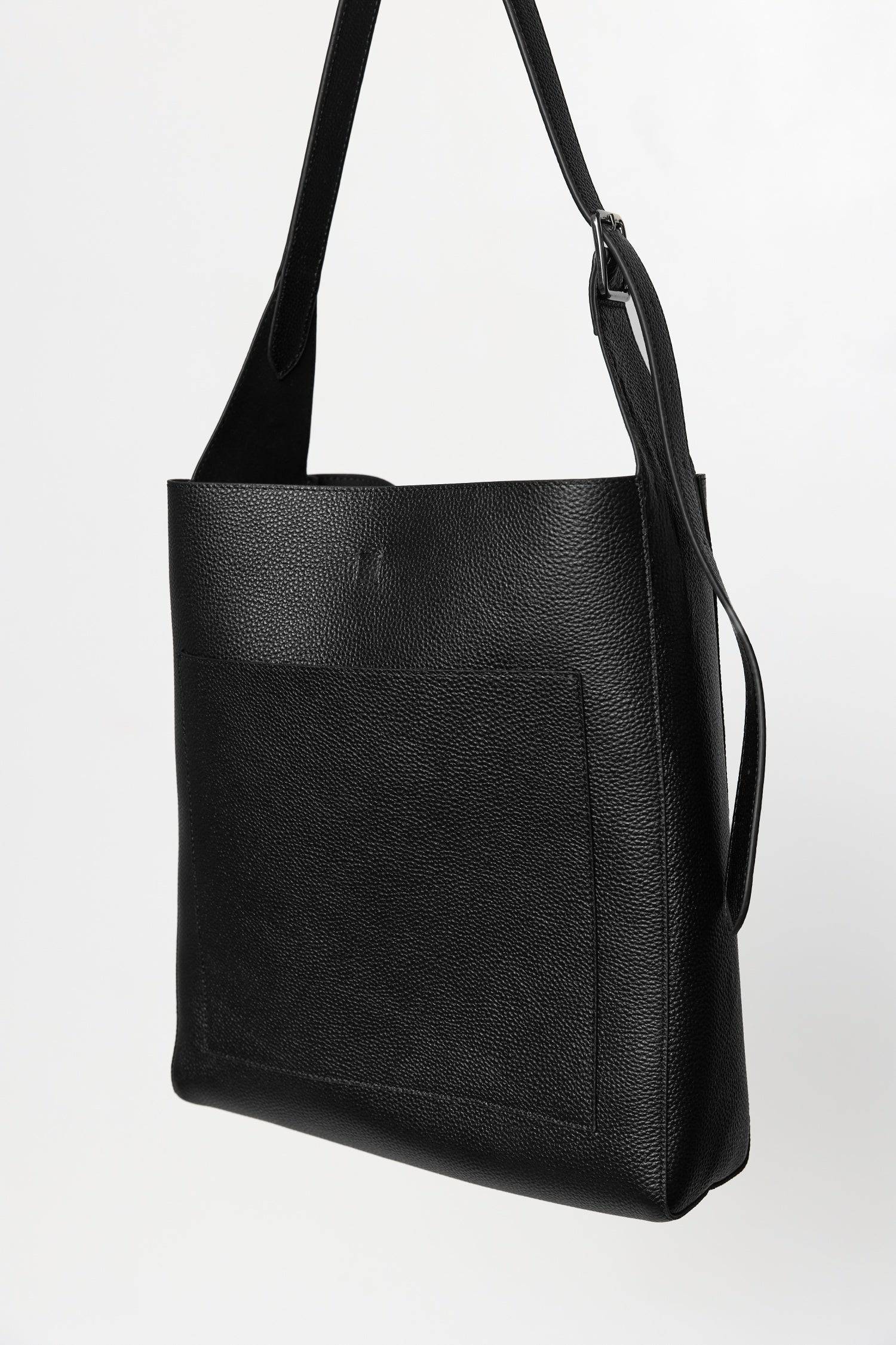 8857790087389, The Brighton Tote Bag, Bags, Mod Ref | Common Market, accessories,bag,bags,cf-color-khaki,cf-color-white,cf-vendor-mod-ref-common-market,dark brown,modrefcommonmarket,Oversized,purse, Information The Brighton Tote Bag is designed with a top snap closure and an exterior slip pocket for easy access to your essentials. It's designed with an adjustable leather shoulder strap for a custom fit and includes a detachable leather pouch for added convenience and organization. Details 100% Cowhide Top S