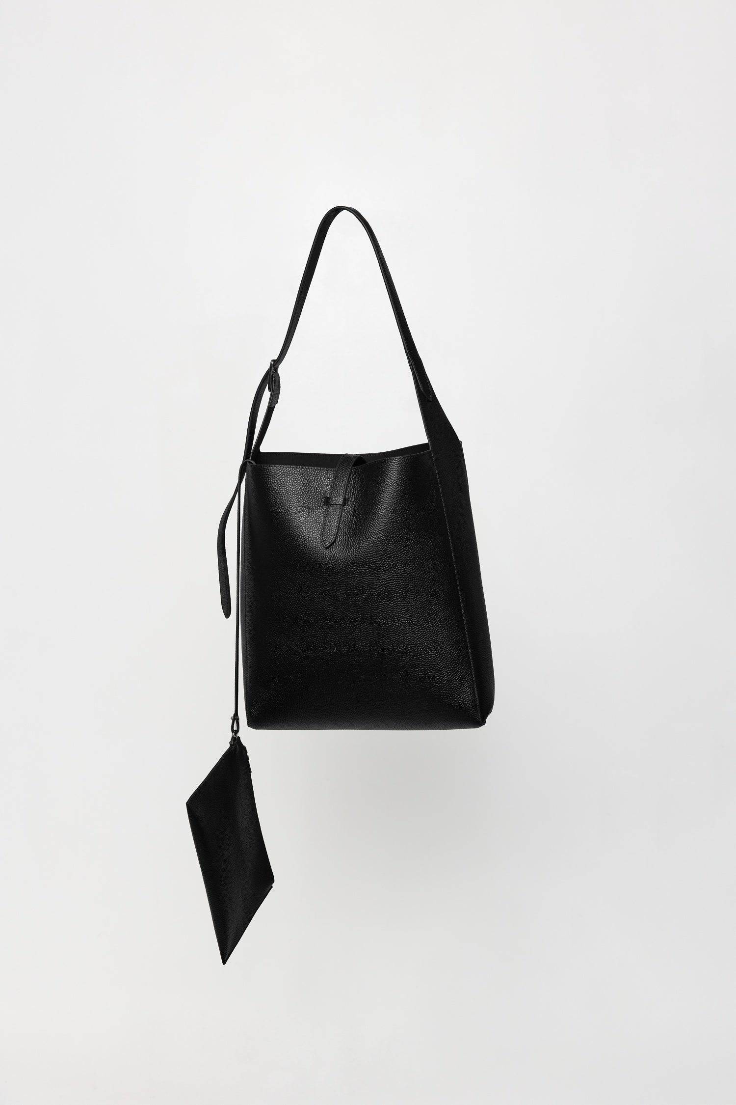 8857790087389, The Brighton Tote Bag, Bags, Mod Ref | Common Market, accessories,bag,bags,cf-color-khaki,cf-color-white,cf-vendor-mod-ref-common-market,dark brown,modrefcommonmarket,Oversized,purse, Information The Brighton Tote Bag is designed with a top snap closure and an exterior slip pocket for easy access to your essentials. It's designed with an adjustable leather shoulder strap for a custom fit and includes a detachable leather pouch for added convenience and organization. Details 100% Cowhide Top S