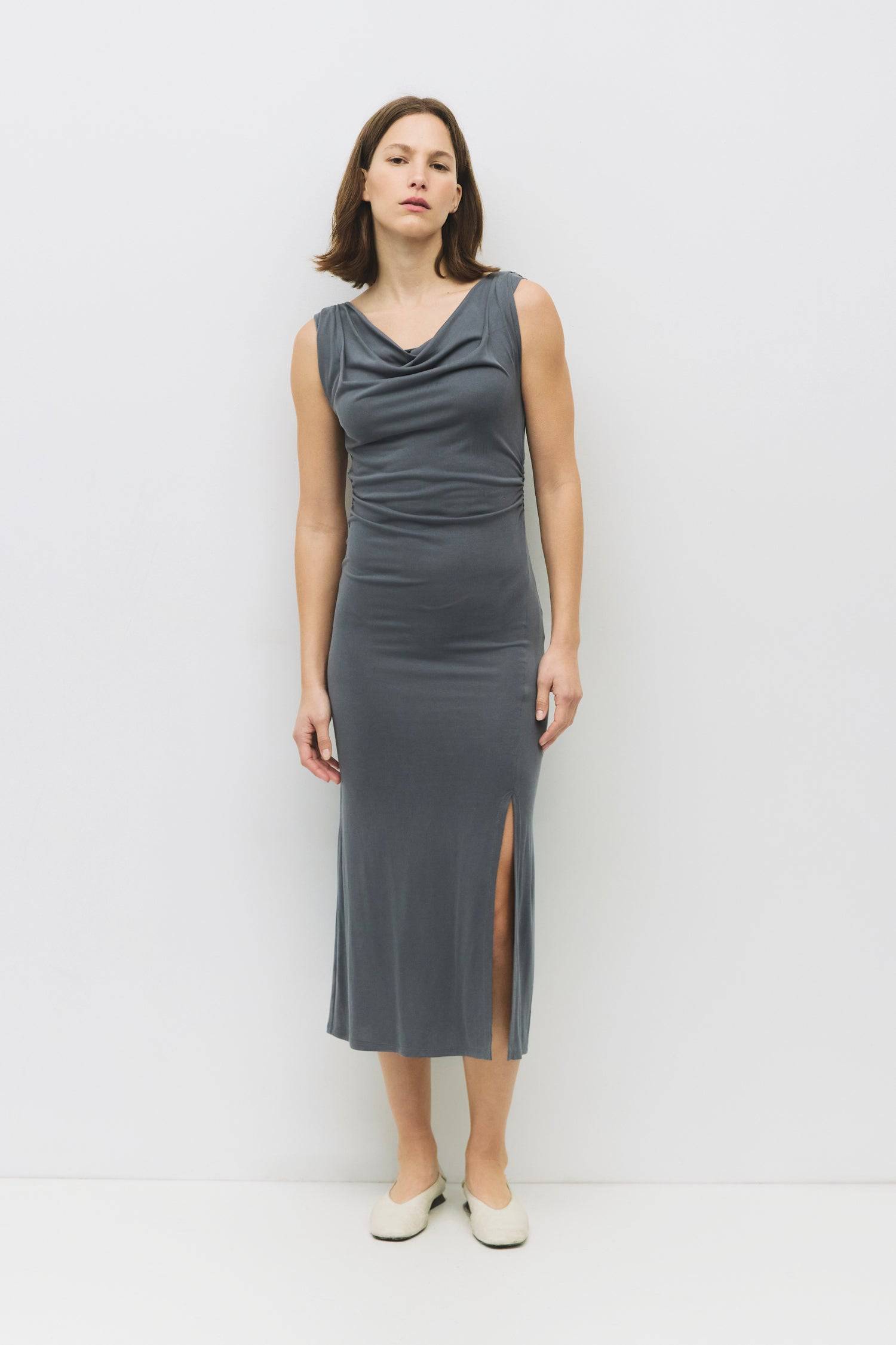 8983741104349, The Parker Dress, Dress, All Row, Black,Casual,cf-color-black,cf-color-red,cf-color-white,cf-size-l,cf-vendor-all-row,collared,Comfort,Comfortable,Feminine,full skirt,Midi,Midi Dress,midi length,new,Red,Sleeveless,Sleeveless Dress,Spring,versatile,white,Womens, Information The Parker Dress is a fitted, cupro knit midi dress with a front cowl neckline and pleated shoulder details. Featuring side waist shirring and a front slit, its maxi length creates a sleek, elegant silhouette. Details 70% R