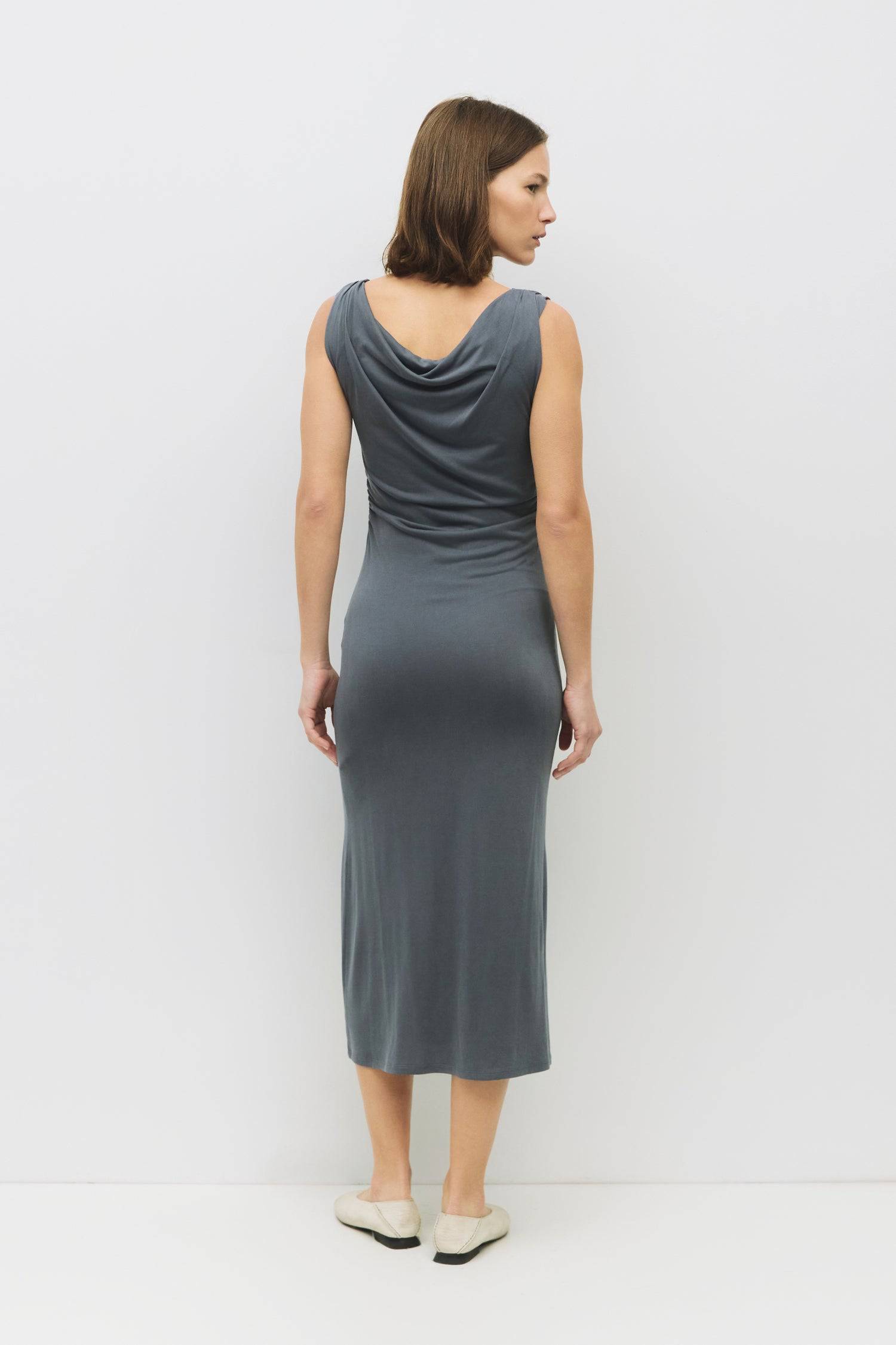 8983741104349, The Parker Dress, Dress, All Row, Black,Casual,cf-color-black,cf-color-red,cf-color-white,cf-size-l,cf-vendor-all-row,collared,Comfort,Comfortable,Feminine,full skirt,Midi,Midi Dress,midi length,new,Red,Sleeveless,Sleeveless Dress,Spring,versatile,white,Womens, Information The Parker Dress is a fitted, cupro knit midi dress with a front cowl neckline and pleated shoulder details. Featuring side waist shirring and a front slit, its maxi length creates a sleek, elegant silhouette. Details 70% R