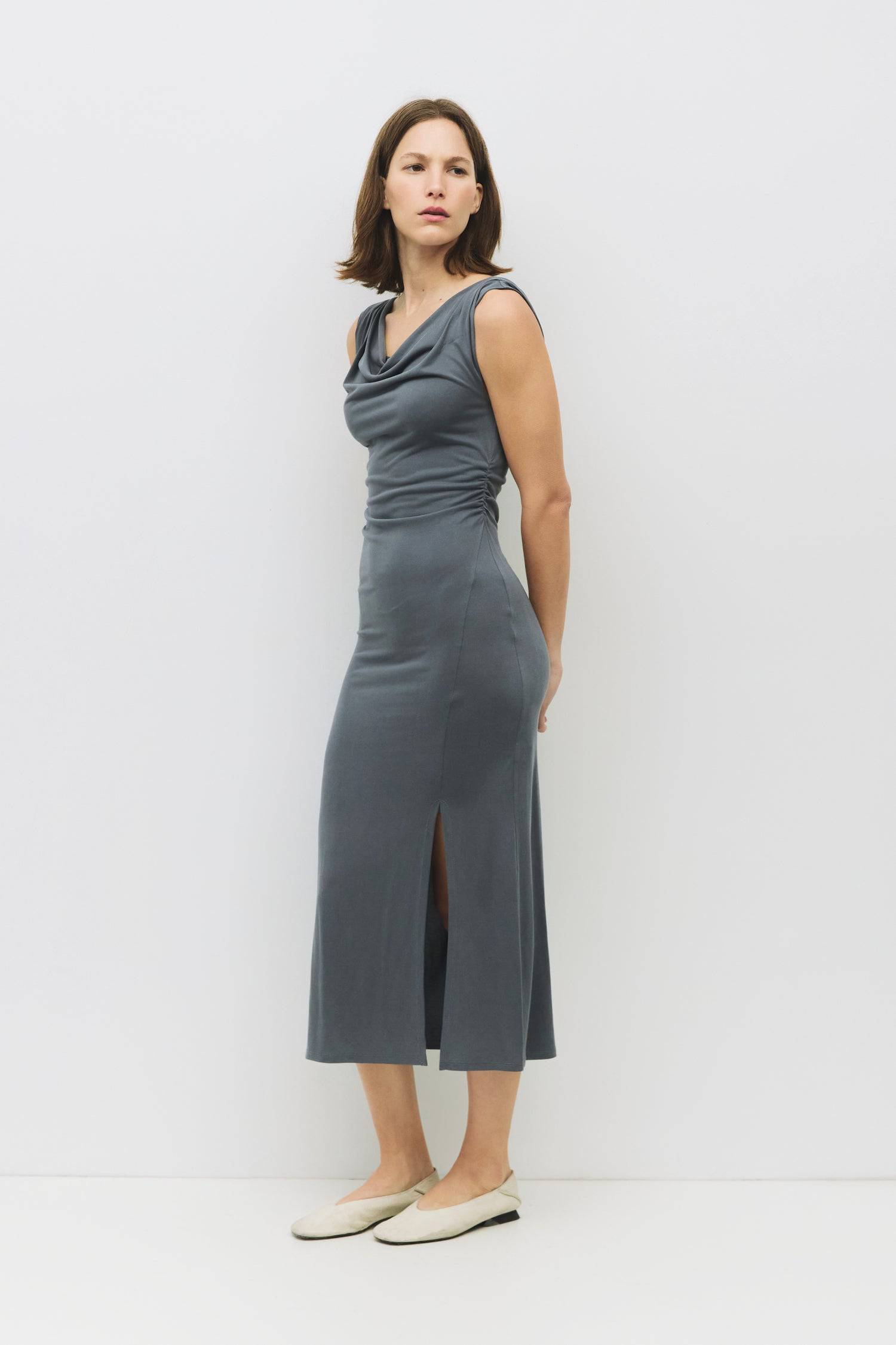 8983741104349, The Parker Dress, Dress, All Row, Black,Casual,cf-color-black,cf-color-red,cf-color-white,cf-size-l,cf-vendor-all-row,collared,Comfort,Comfortable,Feminine,full skirt,Midi,Midi Dress,midi length,new,Red,Sleeveless,Sleeveless Dress,Spring,versatile,white,Womens, Information The Parker Dress is a fitted, cupro knit midi dress with a front cowl neckline and pleated shoulder details. Featuring side waist shirring and a front slit, its maxi length creates a sleek, elegant silhouette. Details 70% R