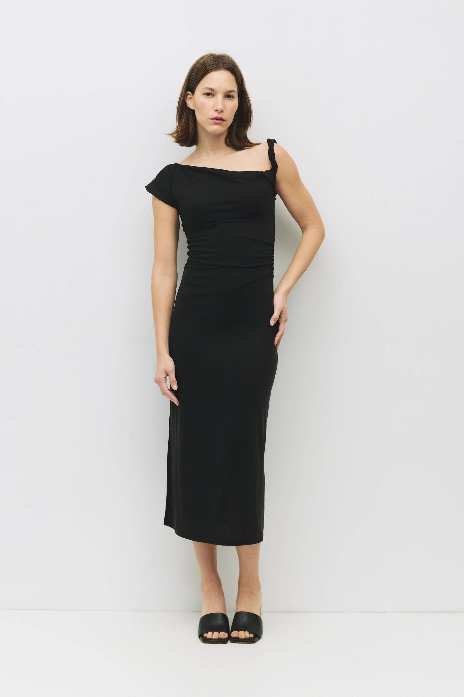 8983742251229, The Itria Dress, Dress, All Row, Black,Casual,cf-color-black,cf-color-red,cf-color-white,cf-size-l,cf-vendor-all-row,collared,Comfort,Comfortable,Feminine,full skirt,Midi,Midi Dress,midi length,new,Red,Sleeveless,Sleeveless Dress,Spring,versatile,white,Womens, Information The Itria Dress is a fitted maxi dress featuring a twisted shoulder strap, asymmetrical neckline, and a shirred waistline for added shape. Its sleek design offers a modern, flattering silhouette perfect for both casual and d