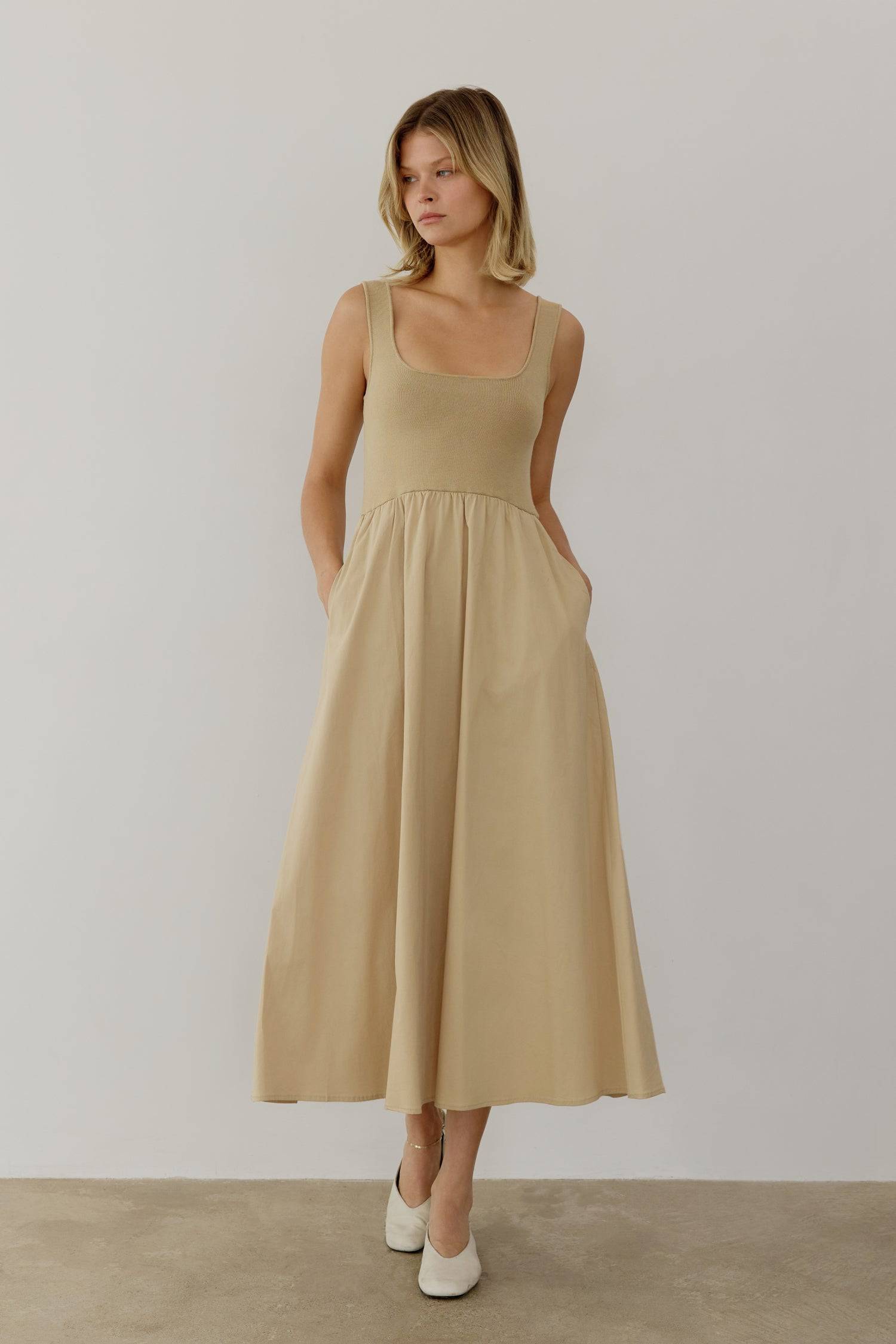 8085492793565, The Lucinda Dress, Dress, All Row, cf-color-white,cf-size-l,cf-size-m,cf-size-s,Cream,Dress,everyday,Front Pockets,ivory,Knit,Long Dress,Maxi,maxi dress,Navy,Pocket,Pockets,Relaxed,Relaxed Fit,spring,Square Back,Square Neckline,Squared Neckline,Summer,tank,tank dress,white, Information The Lucinda Dress is a maxi-length dress with a knit square neckline top and a woven full skirt. The different fabrics create visual interest in this classic silhouette. This style also includes hidden side poc