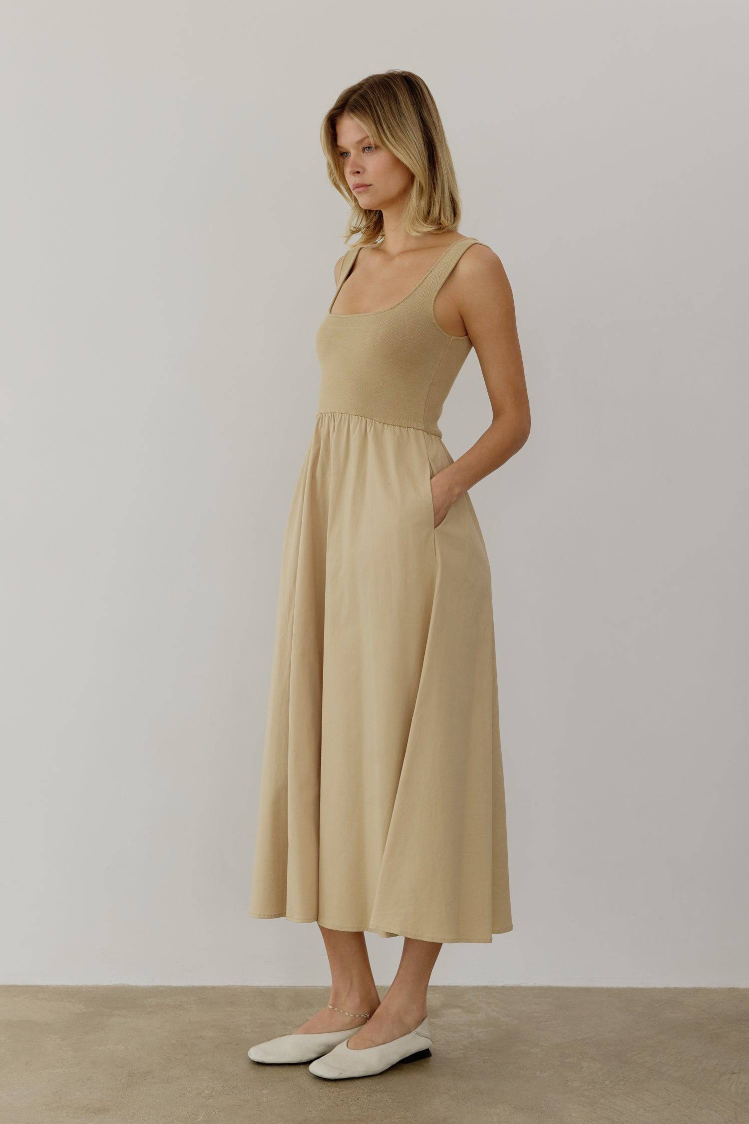 8085492793565, The Lucinda Dress, Dress, All Row, cf-color-white,cf-size-l,cf-size-m,cf-size-s,Cream,Dress,everyday,Front Pockets,ivory,Knit,Long Dress,Maxi,maxi dress,Navy,Pocket,Pockets,Relaxed,Relaxed Fit,spring,Square Back,Square Neckline,Squared Neckline,Summer,tank,tank dress,white, Information The Lucinda Dress is a maxi-length dress with a knit square neckline top and a woven full skirt. The different fabrics create visual interest in this classic silhouette. This style also includes hidden side poc