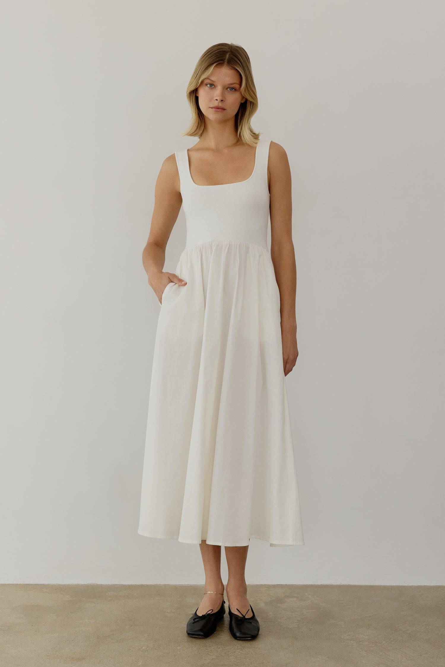 8085492793565, The Lucinda Dress, Dress, All Row, cf-color-white,cf-size-l,cf-size-m,cf-size-s,Cream,Dress,everyday,Front Pockets,ivory,Knit,Long Dress,Maxi,maxi dress,Navy,Pocket,Pockets,Relaxed,Relaxed Fit,spring,Square Back,Square Neckline,Squared Neckline,Summer,tank,tank dress,white, Information The Lucinda Dress is a maxi-length dress with a knit square neckline top and a woven full skirt. The different fabrics create visual interest in this classic silhouette. This style also includes hidden side poc