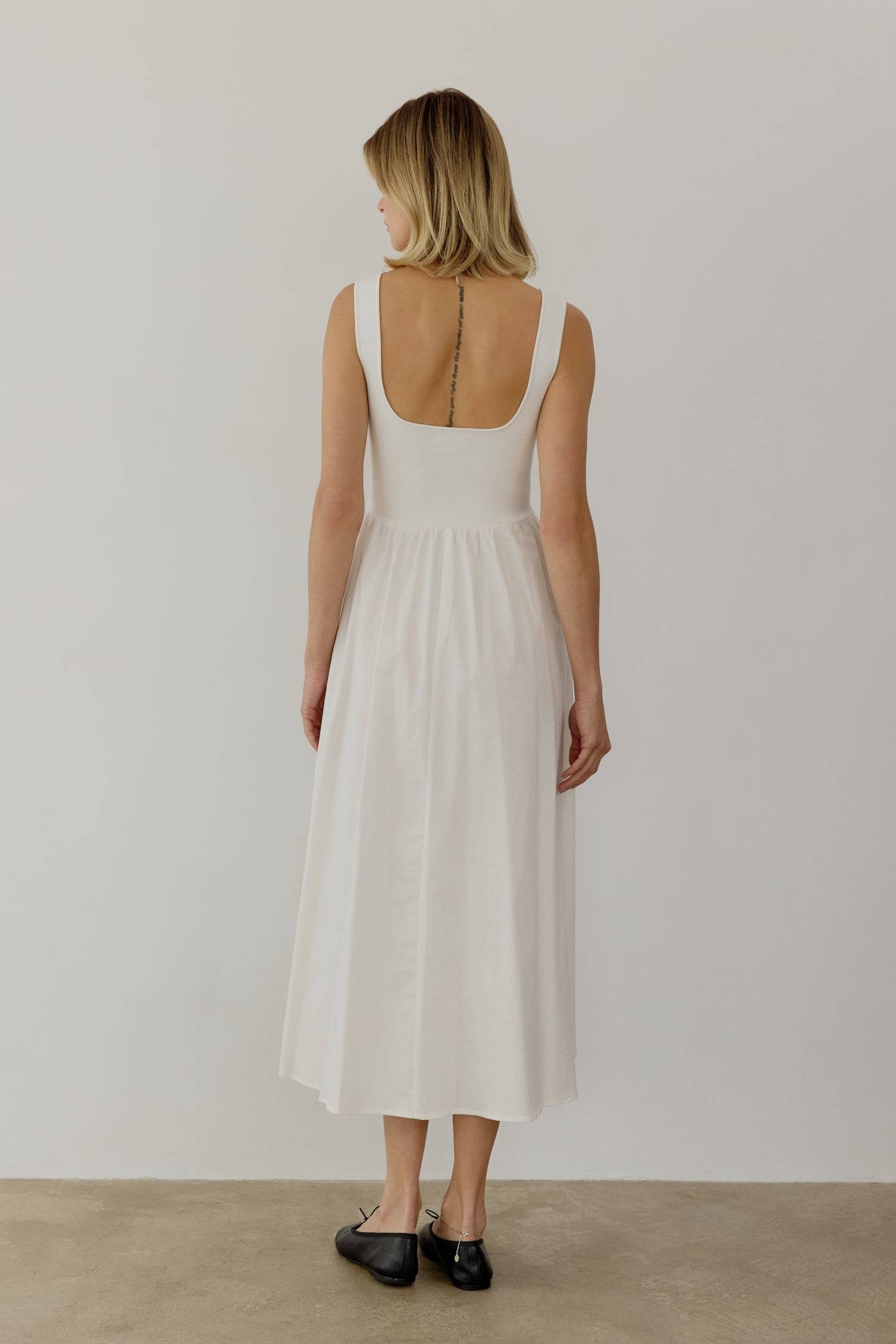 8085492793565, The Lucinda Dress, Dress, All Row, cf-color-white,cf-size-l,cf-size-m,cf-size-s,Cream,Dress,everyday,Front Pockets,ivory,Knit,Long Dress,Maxi,maxi dress,Navy,Pocket,Pockets,Relaxed,Relaxed Fit,spring,Square Back,Square Neckline,Squared Neckline,Summer,tank,tank dress,white, Information The Lucinda Dress is a maxi-length dress with a knit square neckline top and a woven full skirt. The different fabrics create visual interest in this classic silhouette. This style also includes hidden side poc