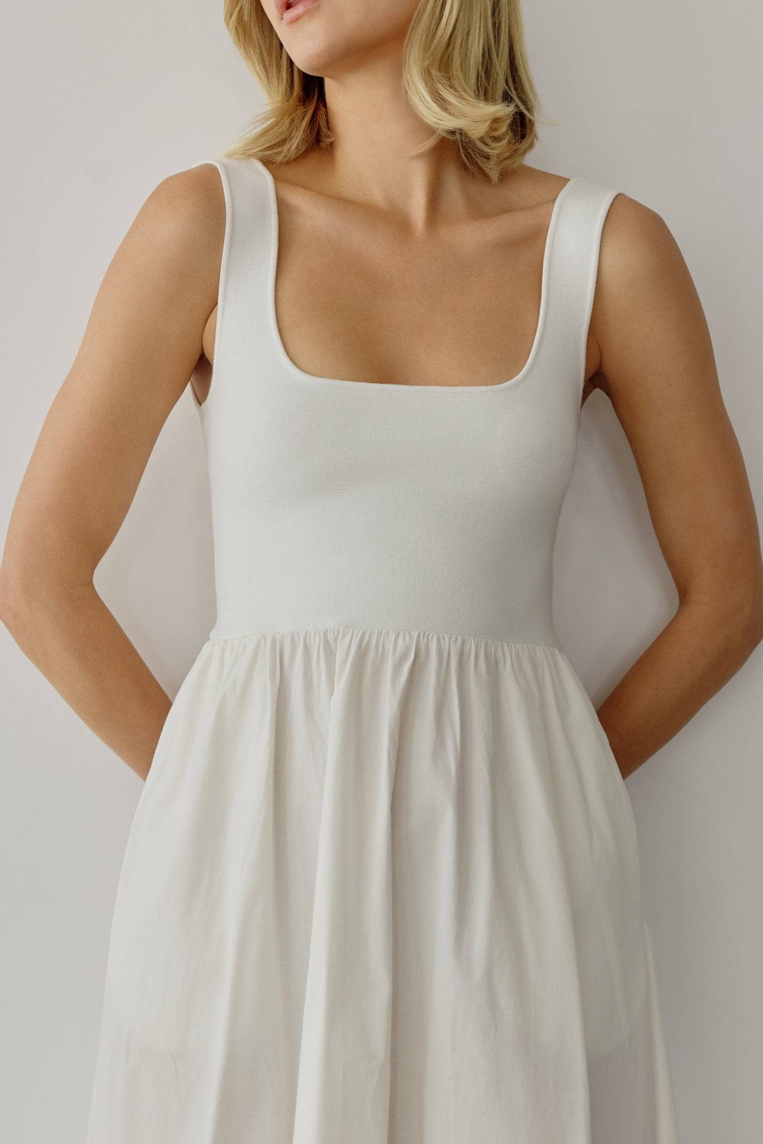 8085492793565, The Lucinda Dress, Dress, All Row, cf-color-white,cf-size-l,cf-size-m,cf-size-s,Cream,Dress,everyday,Front Pockets,ivory,Knit,Long Dress,Maxi,maxi dress,Navy,Pocket,Pockets,Relaxed,Relaxed Fit,spring,Square Back,Square Neckline,Squared Neckline,Summer,tank,tank dress,white, Information The Lucinda Dress is a maxi-length dress with a knit square neckline top and a woven full skirt. The different fabrics create visual interest in this classic silhouette. This style also includes hidden side poc