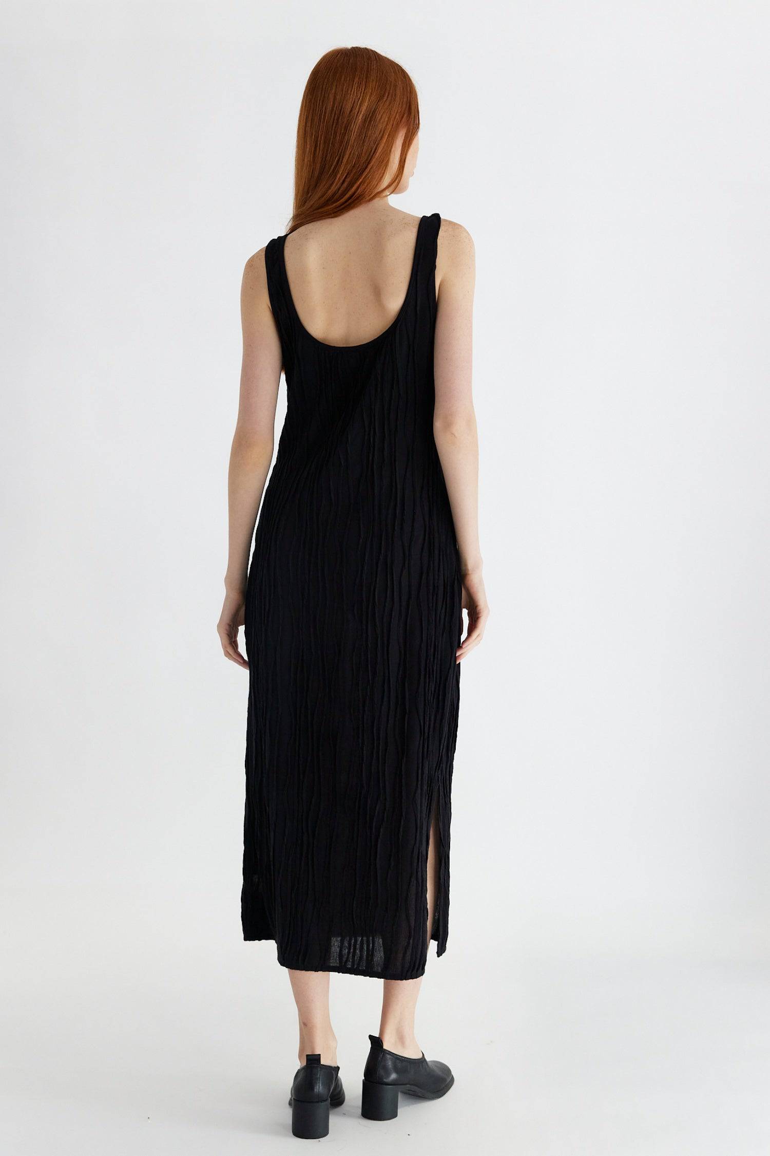 8861267755229, The Aliya Dress, Dress, All Row, Black,bodycon,brown,Casual,cf-color-black,cf-color-ivory,cf-size-l,cf-size-m,cf-size-s,cinched,ivory,Midi,new,nylon,racerback,rust,Sleeveless,Sleeveless Dress,Slit,spring,straight-cut,summer,texture,textured,Textured Fabric,viscose,Women's, Information The Aliya Dress is a tank midi dress that is crafted from a textured, pintucked stretch fabric. It boasts a sheer bodice and a scoop neckline. A summer addition piece to dress up or wear casually. Details Self: