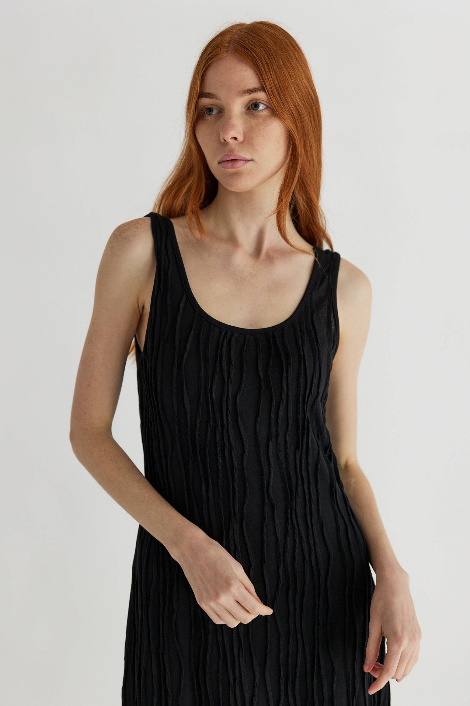 8861267755229, The Aliya Dress, Dress, All Row, Black,bodycon,brown,Casual,cf-color-black,cf-color-ivory,cf-size-l,cf-size-m,cf-size-s,cinched,ivory,Midi,new,nylon,racerback,rust,Sleeveless,Sleeveless Dress,Slit,spring,straight-cut,summer,texture,textured,Textured Fabric,viscose,Women's, Information The Aliya Dress is a tank midi dress that is crafted from a textured, pintucked stretch fabric. It boasts a sheer bodice and a scoop neckline. A summer addition piece to dress up or wear casually. Details Self: