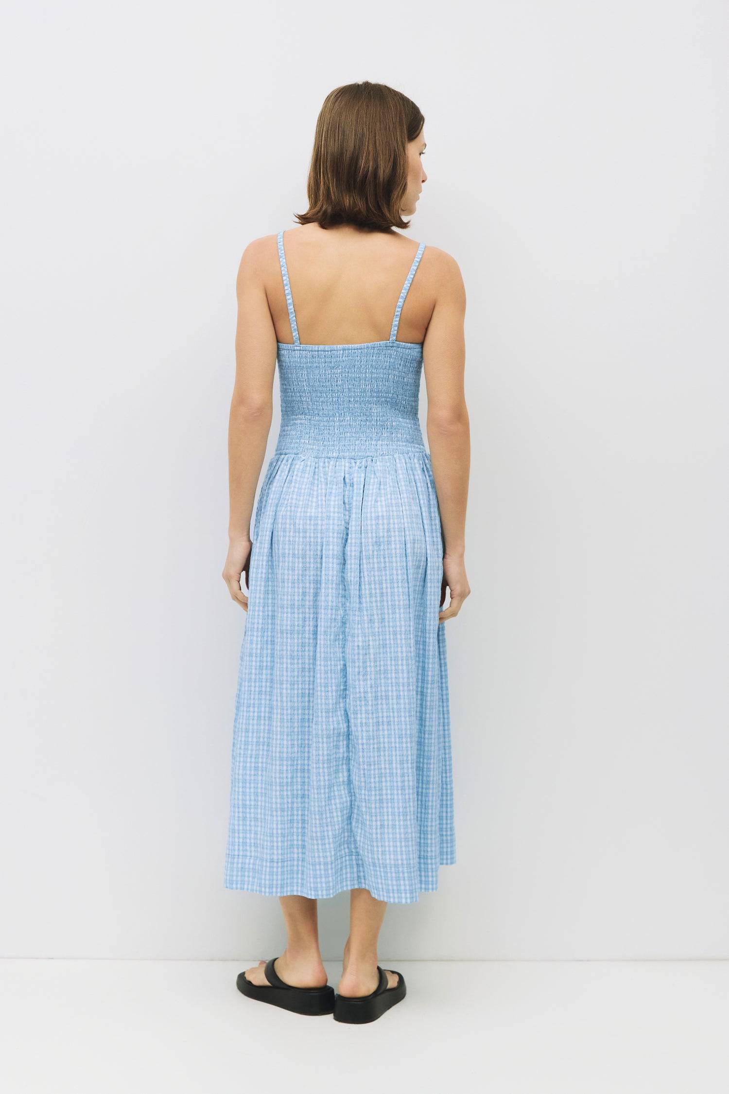 8988733636829, The Ebony Dress, Dress, All Row, brown,Casual,cf-color-chestnut,cf-color-natural,cf-color-white,cf-size-l,cf-size-m,cf-size-s,cf-vendor-all-row,Chestnut Brown,Comfort,Comfortable,dark brown,Feminine,Midi,Midi Dress,midi length,Minimal,natural,new,Pockets,Semi-Formal,side pockets,Sleeveless,Sleeveless Dress,Slight Flare,Smocked,Spring,versatile,white,Womens, Information The Ebony Dress is a midi-length, fit-and-flare style with a textured plaid print and elasticated shoulder straps for added c