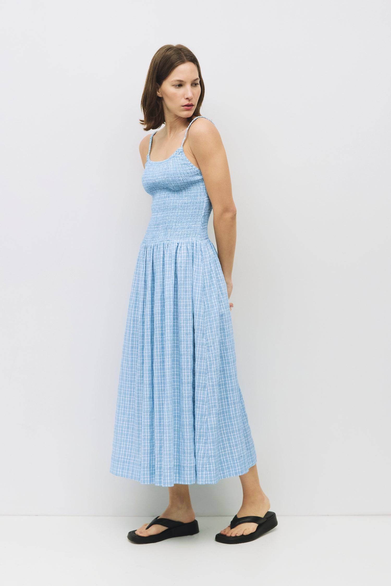 8988733636829, The Ebony Dress, Dress, All Row, brown,Casual,cf-color-chestnut,cf-color-natural,cf-color-white,cf-size-l,cf-size-m,cf-size-s,cf-vendor-all-row,Chestnut Brown,Comfort,Comfortable,dark brown,Feminine,Midi,Midi Dress,midi length,Minimal,natural,new,Pockets,Semi-Formal,side pockets,Sleeveless,Sleeveless Dress,Slight Flare,Smocked,Spring,versatile,white,Womens, Information The Ebony Dress is a midi-length, fit-and-flare style with a textured plaid print and elasticated shoulder straps for added c