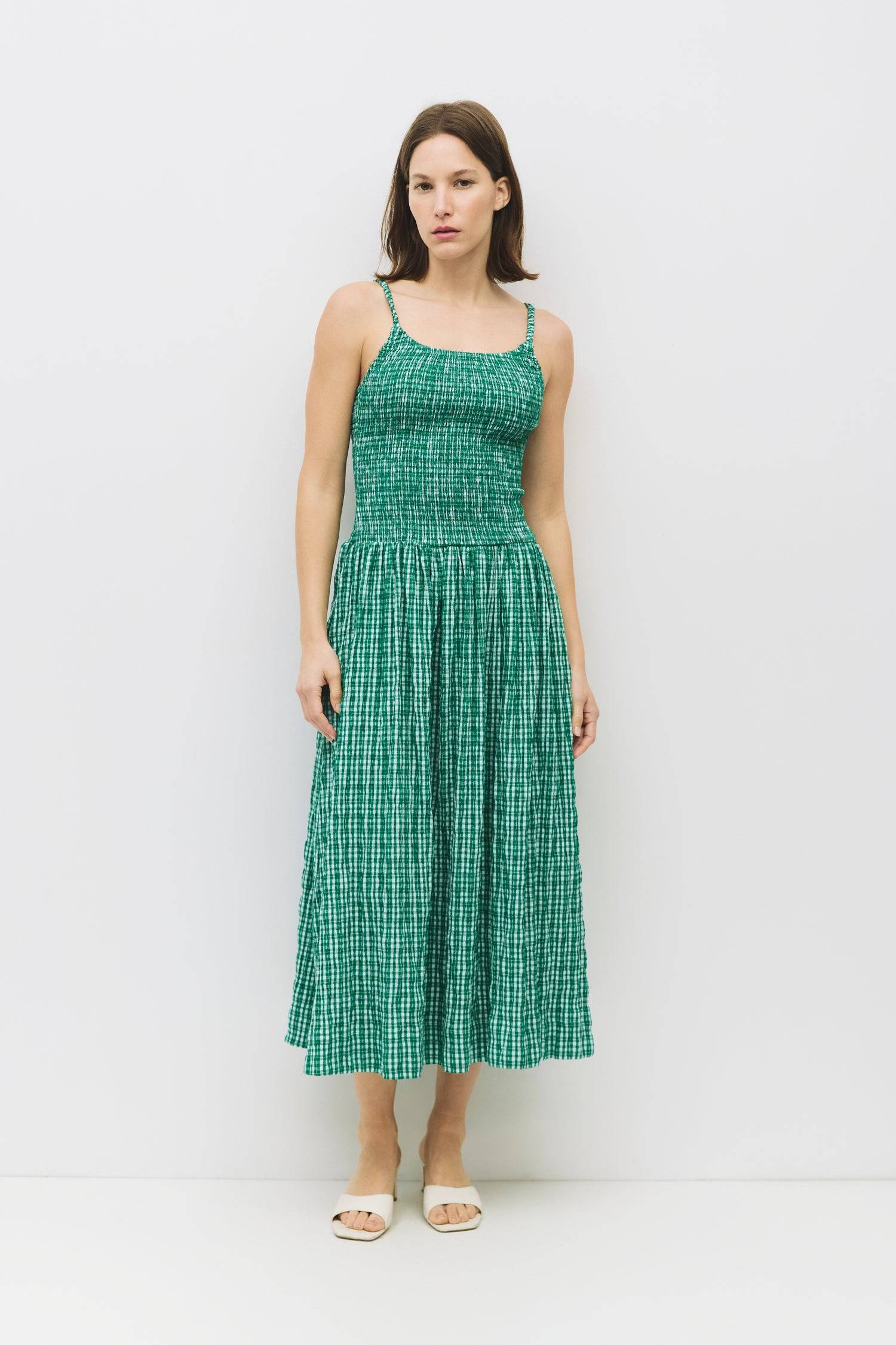 8988733636829, The Ebony Dress, Dress, All Row, brown,Casual,cf-color-chestnut,cf-color-natural,cf-color-white,cf-size-l,cf-size-m,cf-size-s,cf-vendor-all-row,Chestnut Brown,Comfort,Comfortable,dark brown,Feminine,Midi,Midi Dress,midi length,Minimal,natural,new,Pockets,Semi-Formal,side pockets,Sleeveless,Sleeveless Dress,Slight Flare,Smocked,Spring,versatile,white,Womens, Information The Ebony Dress is a midi-length, fit-and-flare style with a textured plaid print and elasticated shoulder straps for added c