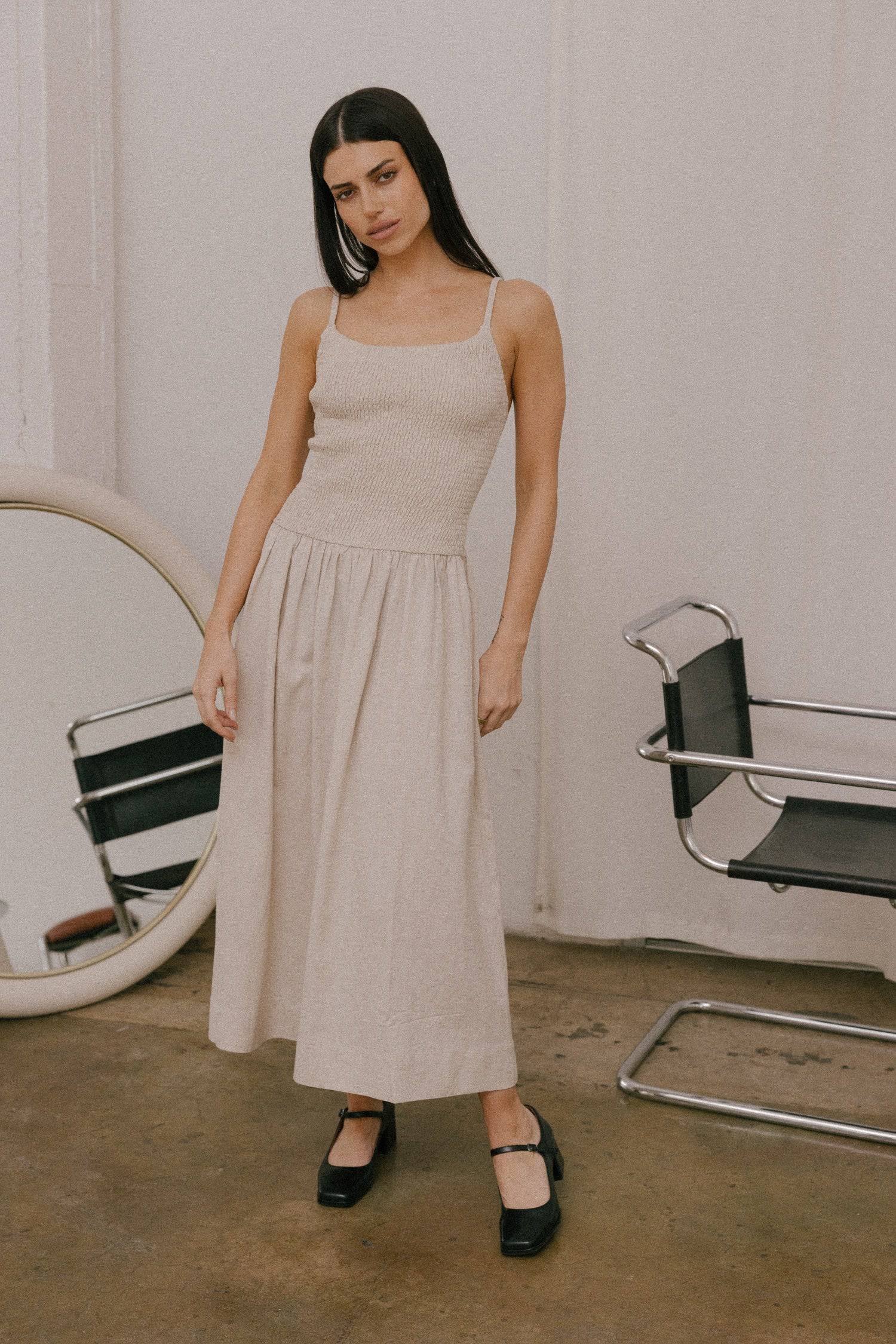 8346250805469, The Marcella Dress, Dress, All Row, brown,Casual,cf-color-chestnut,cf-color-natural,cf-color-white,cf-size-l,cf-size-m,cf-size-s,cf-vendor-all-row,Chestnut Brown,Comfort,Comfortable,dark brown,Feminine,Midi,Midi Dress,midi length,Minimal,minimalist,natural,new,Pockets,Semi-Formal,side pockets,Sleeveless,Sleeveless Dress,Slight Flare,Smocked,Spring,versatile,white,Womens, Information Meet The Marcella Dress, a stunning smocked dress that boasts a midi length with a fit and flare design that en