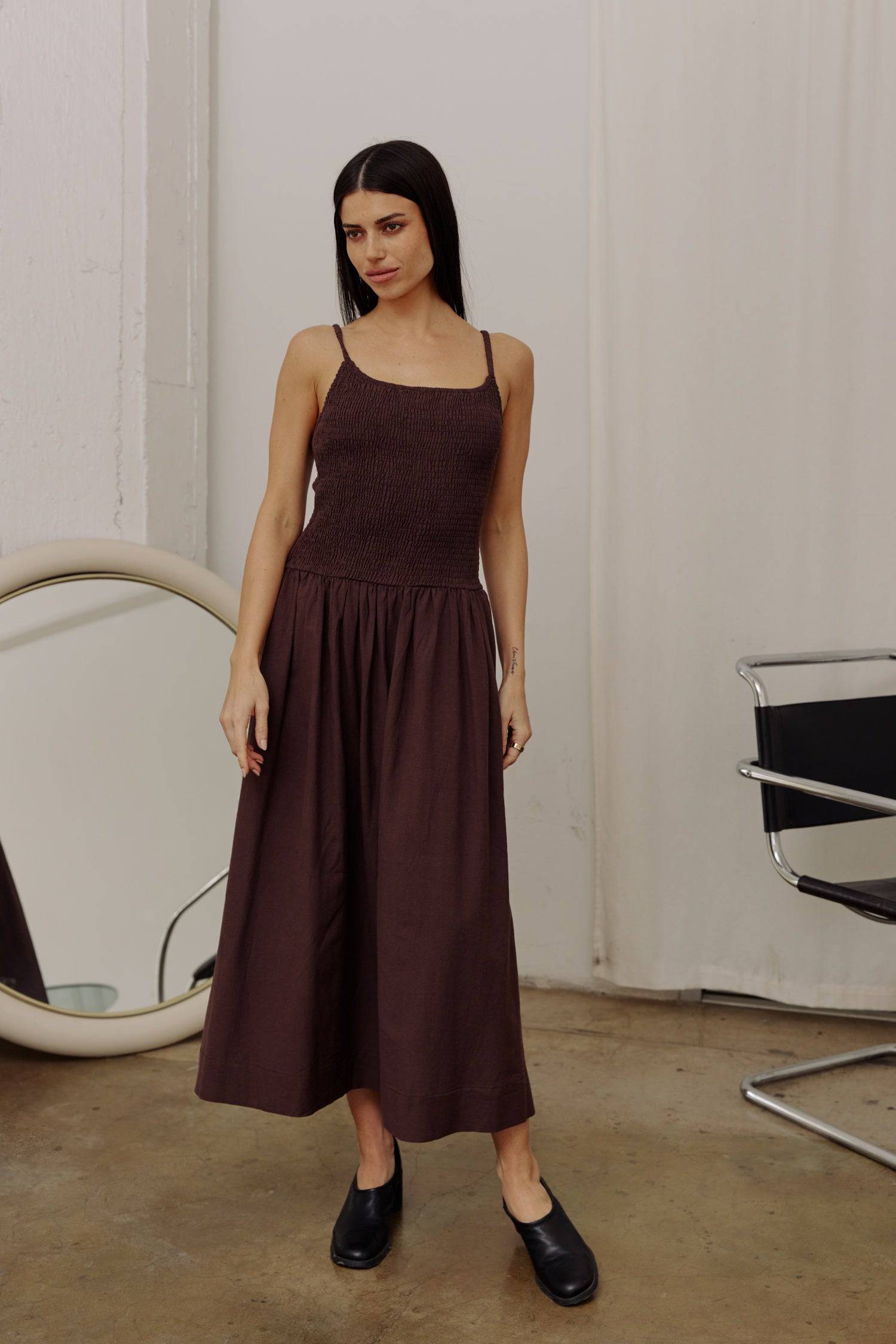 8346250805469, The Marcella Dress, Dress, All Row, brown,Casual,cf-color-chestnut,cf-color-natural,cf-color-white,cf-size-l,cf-size-m,cf-size-s,cf-vendor-all-row,Chestnut Brown,Comfort,Comfortable,dark brown,Feminine,Midi,Midi Dress,midi length,Minimal,minimalist,natural,new,Pockets,Semi-Formal,side pockets,Sleeveless,Sleeveless Dress,Slight Flare,Smocked,Spring,versatile,white,Womens, Information Meet The Marcella Dress, a stunning smocked dress that boasts a midi length with a fit and flare design that en