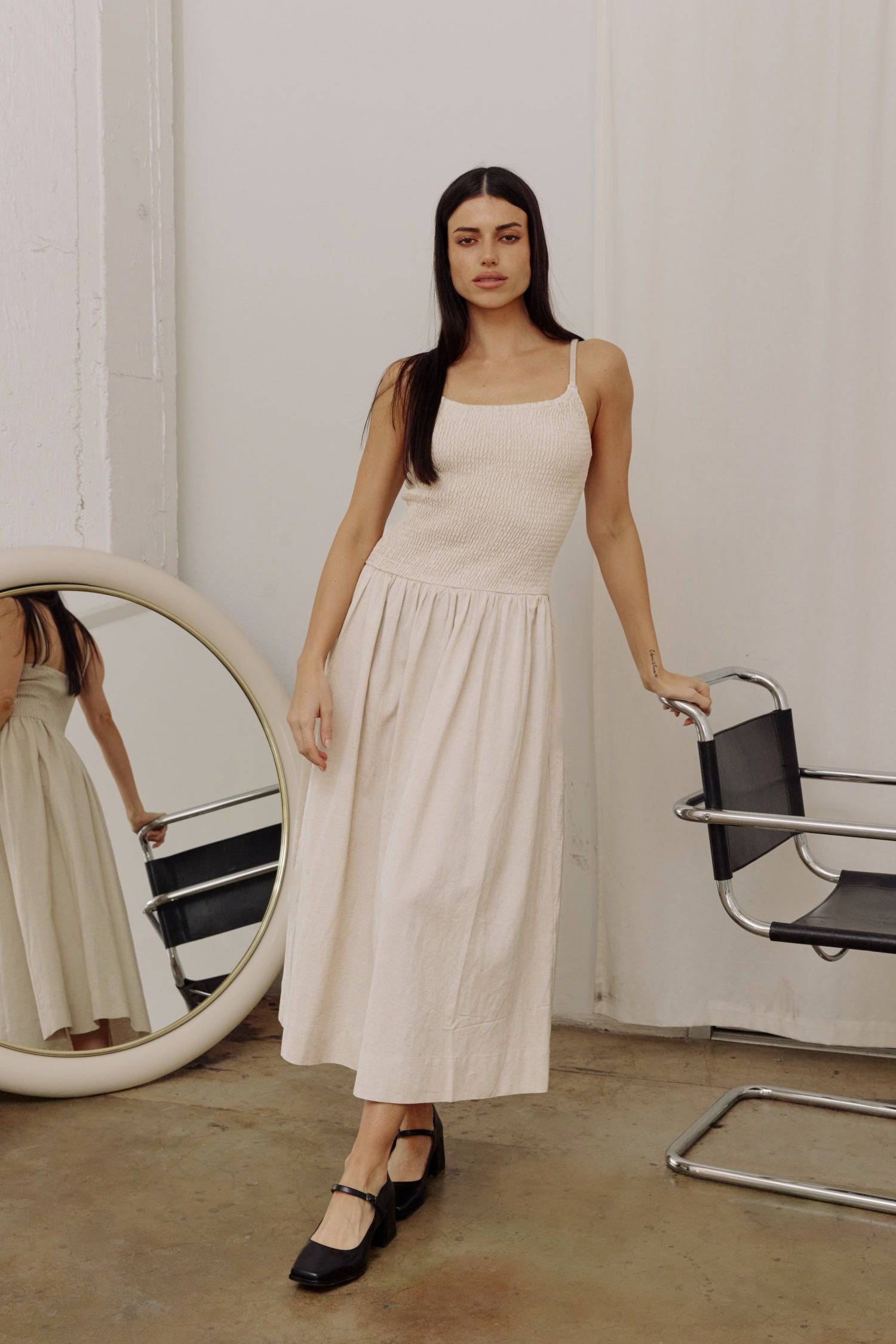 8346250805469, The Marcella Dress, Dress, All Row, brown,Casual,cf-color-chestnut,cf-color-natural,cf-color-white,cf-size-l,cf-size-m,cf-size-s,cf-vendor-all-row,Chestnut Brown,Comfort,Comfortable,dark brown,Feminine,Midi,Midi Dress,midi length,Minimal,minimalist,natural,new,Pockets,Semi-Formal,side pockets,Sleeveless,Sleeveless Dress,Slight Flare,Smocked,Spring,versatile,white,Womens, Information Meet The Marcella Dress, a stunning smocked dress that boasts a midi length with a fit and flare design that en