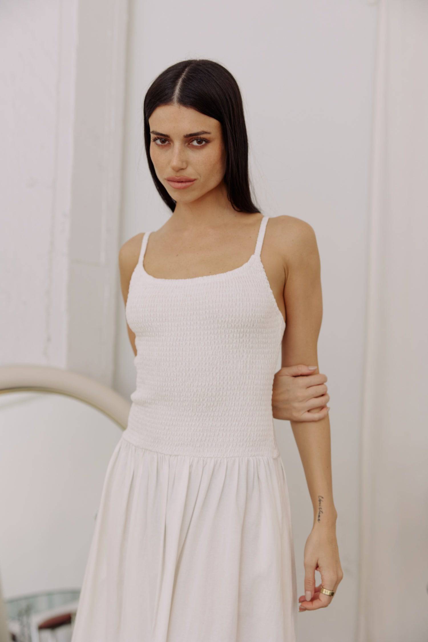 8346250805469, The Marcella Dress, Dress, All Row, brown,Casual,cf-color-chestnut,cf-color-natural,cf-color-white,cf-size-l,cf-size-m,cf-size-s,cf-vendor-all-row,Chestnut Brown,Comfort,Comfortable,dark brown,Feminine,Midi,Midi Dress,midi length,Minimal,minimalist,natural,new,Pockets,Semi-Formal,side pockets,Sleeveless,Sleeveless Dress,Slight Flare,Smocked,Spring,versatile,white,Womens, Information Meet The Marcella Dress, a stunning smocked dress that boasts a midi length with a fit and flare design that en