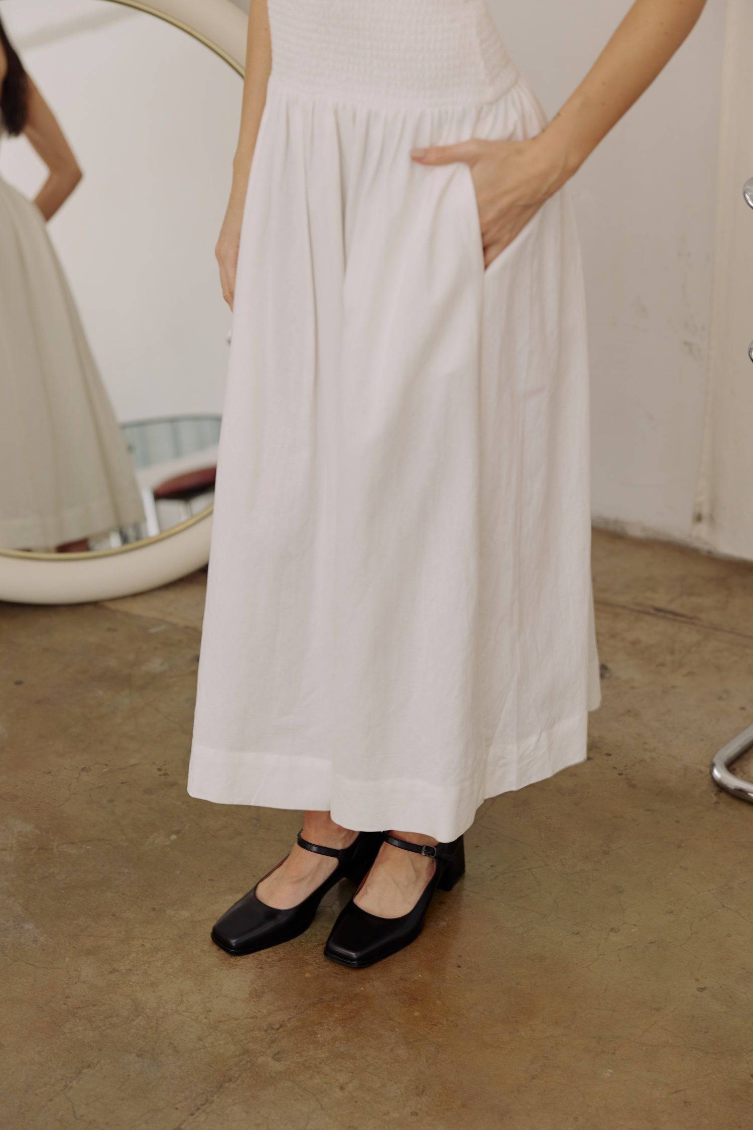 8346250805469, The Marcella Dress, Dress, All Row, brown,Casual,cf-color-chestnut,cf-color-natural,cf-color-white,cf-size-l,cf-size-m,cf-size-s,cf-vendor-all-row,Chestnut Brown,Comfort,Comfortable,dark brown,Feminine,Midi,Midi Dress,midi length,Minimal,minimalist,natural,new,Pockets,Semi-Formal,side pockets,Sleeveless,Sleeveless Dress,Slight Flare,Smocked,Spring,versatile,white,Womens, Information Meet The Marcella Dress, a stunning smocked dress that boasts a midi length with a fit and flare design that en