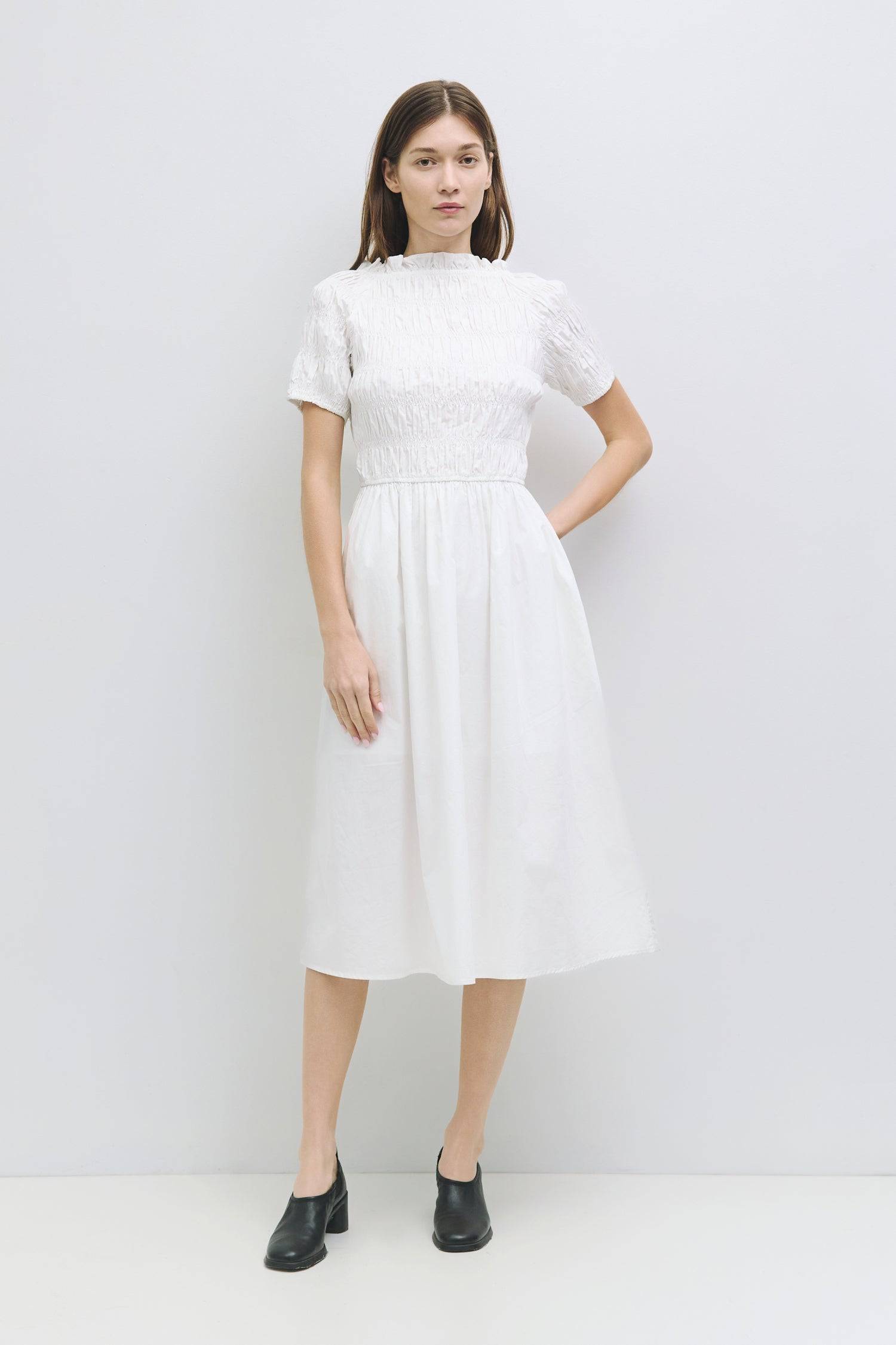 9045699035357, The Roland Dress, Dress, All Row, adjustable ties,Black,Casual,cf-color-black,cf-color-cream,cf-size-l,cf-vendor-all-row,Comfort,Comfortable,Cream,Dress,dressy,Elastic Waist,Feminine,fit and flare,full skirt,Light Blue,Midi,Midi Dress,midi length,new,open back,Semi-Formal,Shirred Bodice,Spring,Summer,Transitional,versatile,Womens, Information The Roland Dress is a shirred midi dress featuring a fit-and-flare design with an open back and tie detail. The midi length and attached lining skirt en