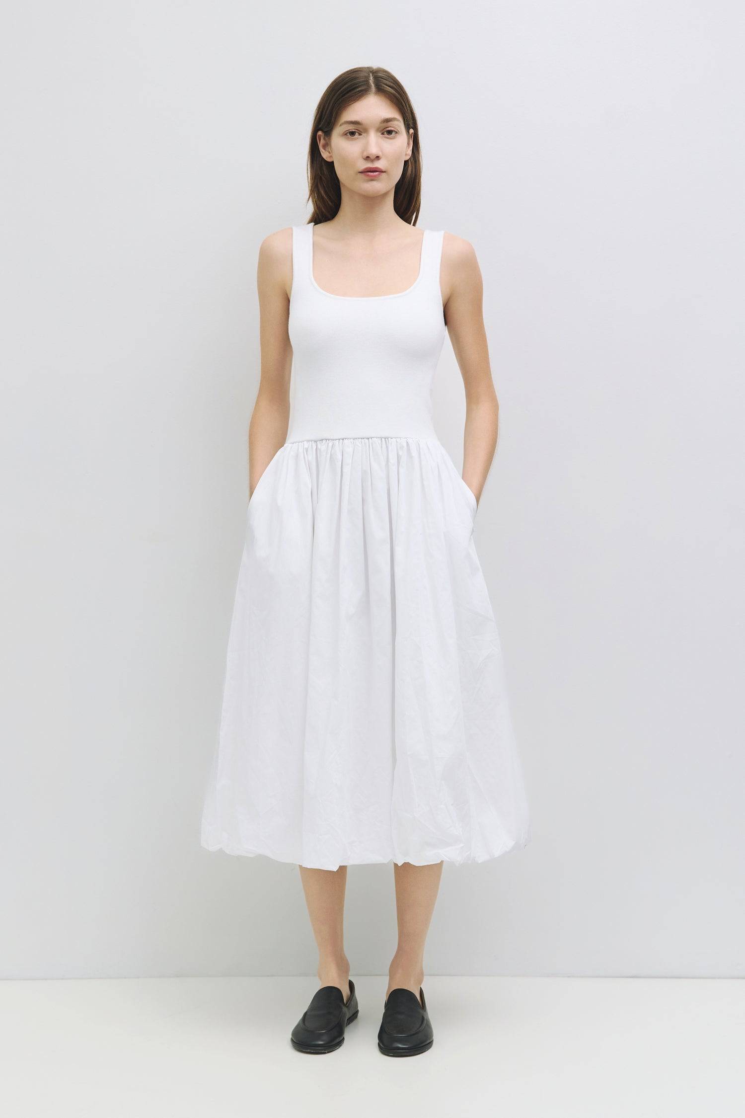 8831787335901, The Bella Dress, Dress, All Row, Black,bubble,bubble skirt,Casual,cf-color-black,cf-size-l,cf-vendor-all-row,Comfort,Comfortable,Dress,Elastic Waist,Everyday,Feminine,full skirt,Midi,Midi Dress,midi length,new,Pockets,rounded neckline,Semi-Formal,Sleeveless,Sleeveless Dress,stretch,Stretchy,versatile,Womens, Information The Bella Dress is a chic evolution of The Lucinda Dress, featuring a bubble skirt reminiscent of The Bella Skirt. Crafted with a midi length, this dress is designed with a di