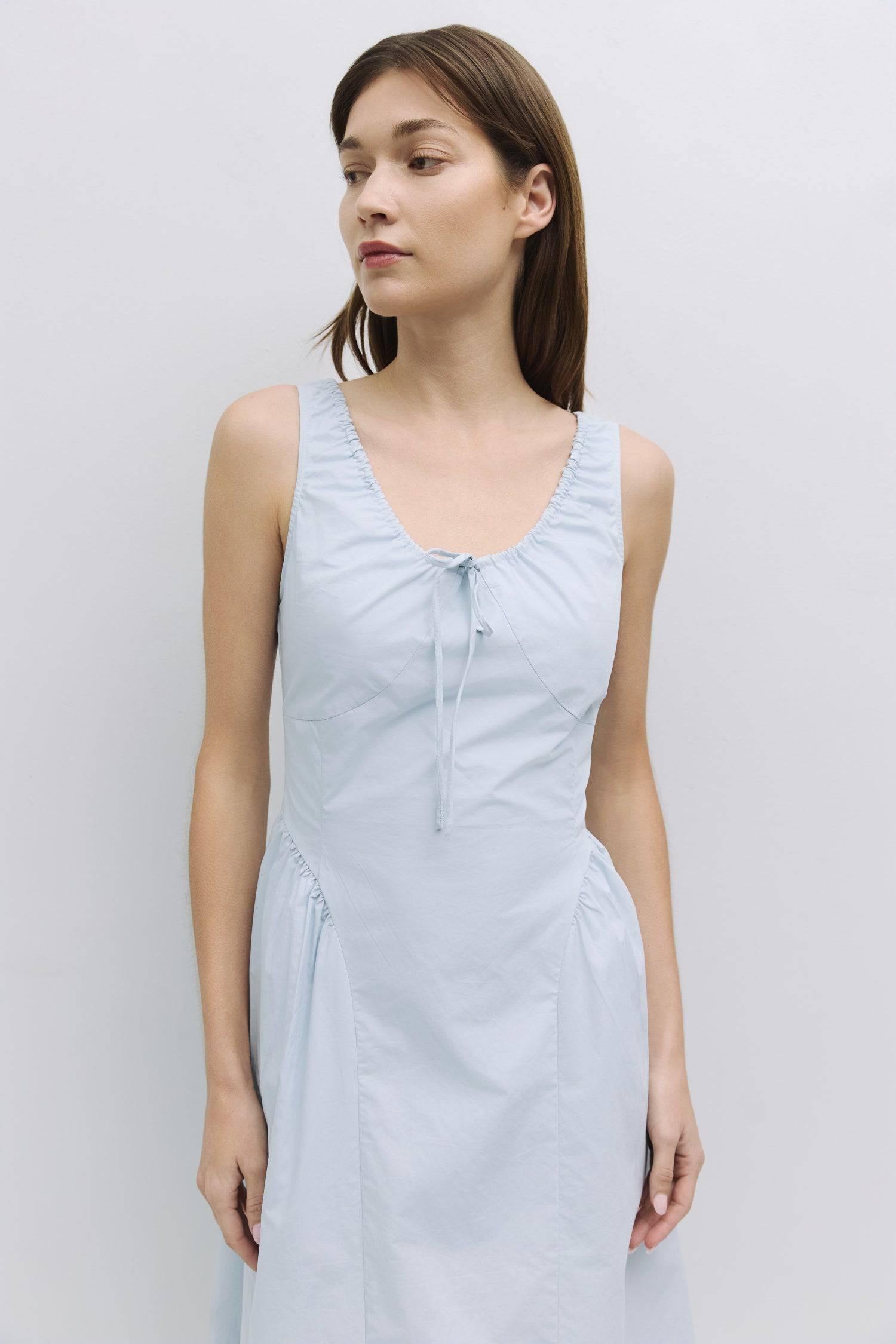 8911662874845, The Anika Dress, Dress, All Row, Casual,cf-color-white,cf-size-l,cf-size-m,cf-size-s,cf-vendor-mod-ref,Cinched Waist,Comfortable,Cotton,curve skirt,drawstring waist,Dress,dressy,final-sale,finalsale,Long Dress,maxi dress,Mid Length Dress,Midi,Midi Dress,midi length,new,sale,side pockets,Sleeveless,Spring,Summer,voluminous,womens, Information The Anika Dress is a comfortable sleeveless midi dress featuring a gathered neck design and front ties for a personalized fit. With shirring around the n