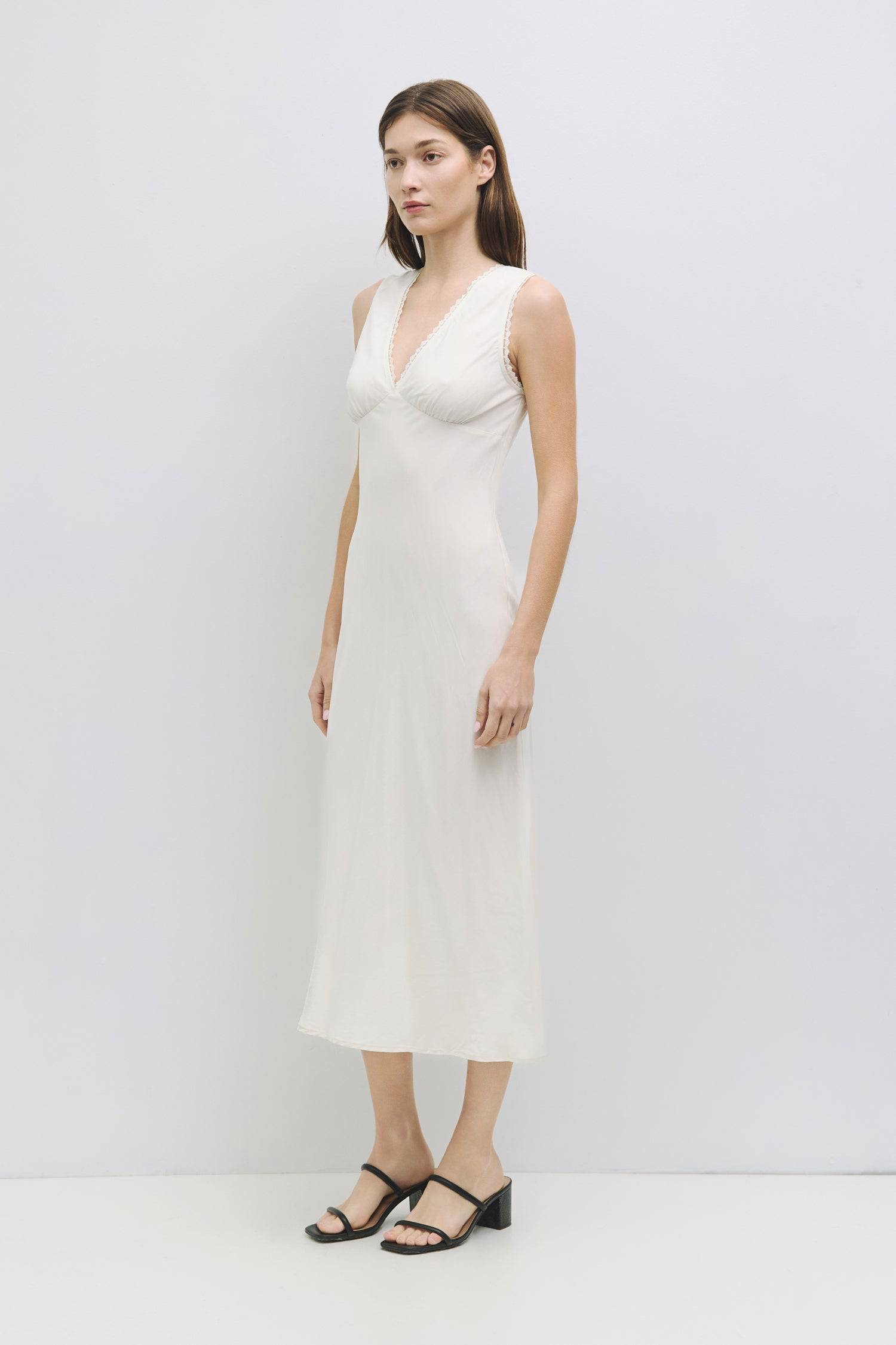 8911665627357, The Arielle Dress, Dress, All Row, All Row,cf-color-cream,cf-size-l,cf-size-m,cf-size-s,Comfortable,Cotton,Cream,Dress,dressy,final-sale,finalsale,fit and flare,flattering,Form Fitting,lace,lace trim,Long Dress,maxi dress,Mid Length Dress,Midi,Midi Dress,midi length,new,sale,Spring,Summer,V Neckline,womens, Information The Arielle Dress is a midi-length dress featuring a flattering contrast lace trim around the V-neckline and armholes making it easy to dress up or down for a variety of occasi