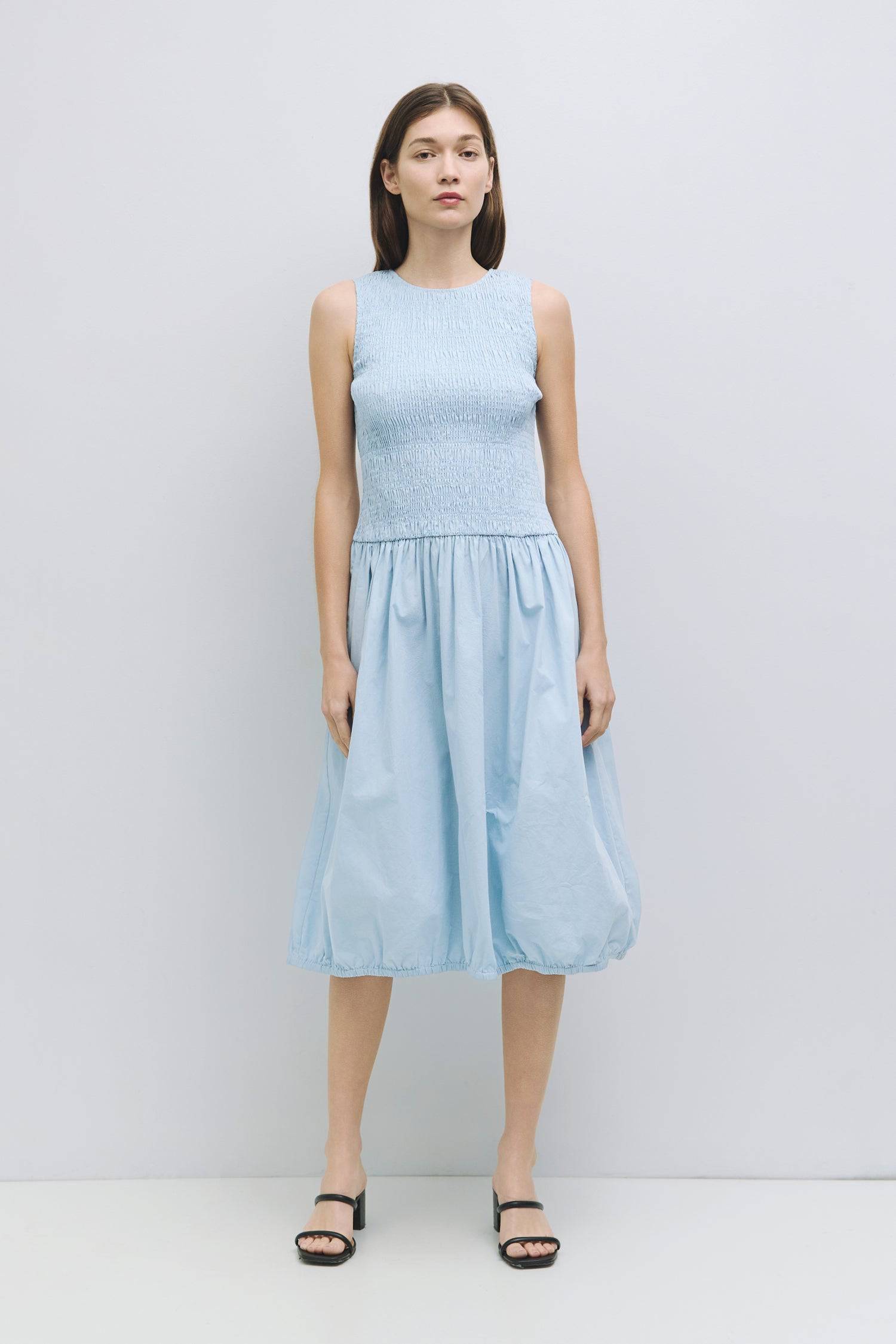 8982638821597, The Isla Dress, Dress, All Row, adjustable straps,Casual,cf-color-black,cf-color-white,cf-size-l,cf-vendor-all-row,Comfort,Comfortable,Elastic Waist,Feminine,full skirt,Light Blue,Midi,Midi Dress,midi length,new,Pockets,Semi-Formal,Sleeveless,Sleeveless Dress,Spring,versatile,white,Womens, Information The Isla Dress is the perfect spring and summer midi dress designed with a smocked top, crew neckline, elastic shirred hem, and back keyhole button closure. Details 100% Cotton Smocked Top Crew