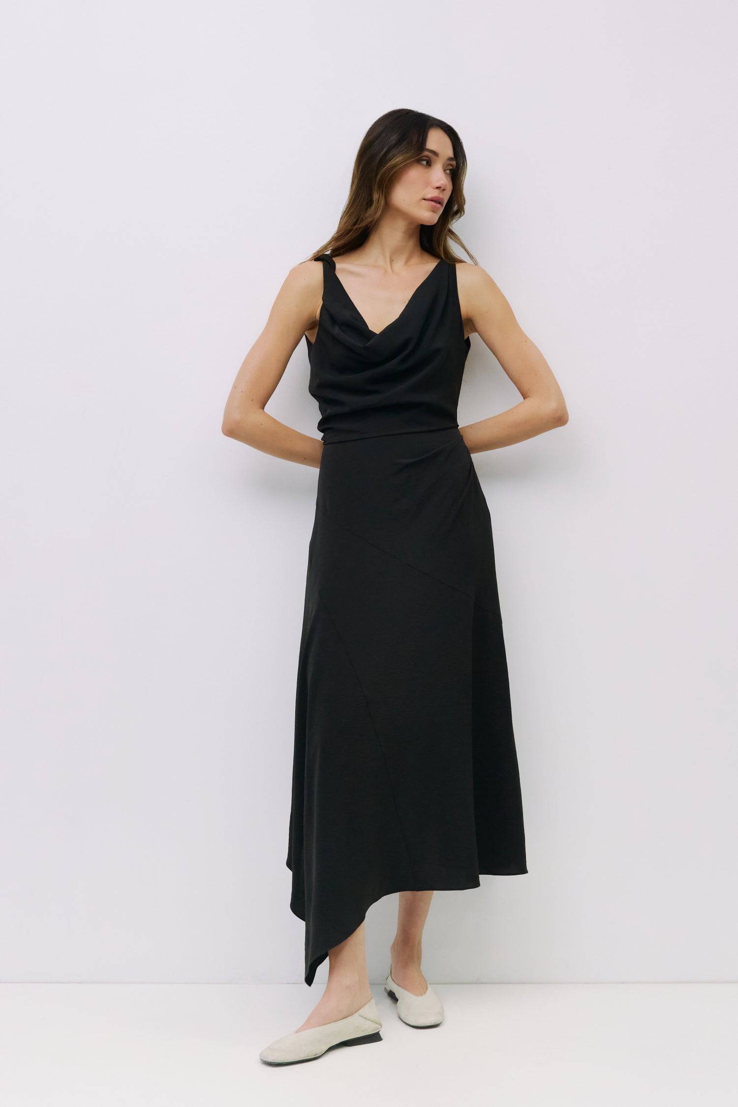 9023137677533, The Renee Dress, Dress, Mod Ref, asymmetrical,asymmetrical skirt,Black,Blue,cf-color-black,cf-size-l,cf-vendor-all-row,collared,Comfort,Comfortable,cowl neck,drape,Draped,Feminine,fit and flare,fitted bodice,formal,full skirt,Light Blue,Midi,Midi Dress,midi length,new,Red,Relaxed Fit,semi formal,Sleeveless,Sleeveless Dress,Spring,versatile,Womens, Information The Renee Dress is a sleeveless maxi dress with an asymmetrical cowl neckline and a twisted strap detail on the right shoulder. Fitted