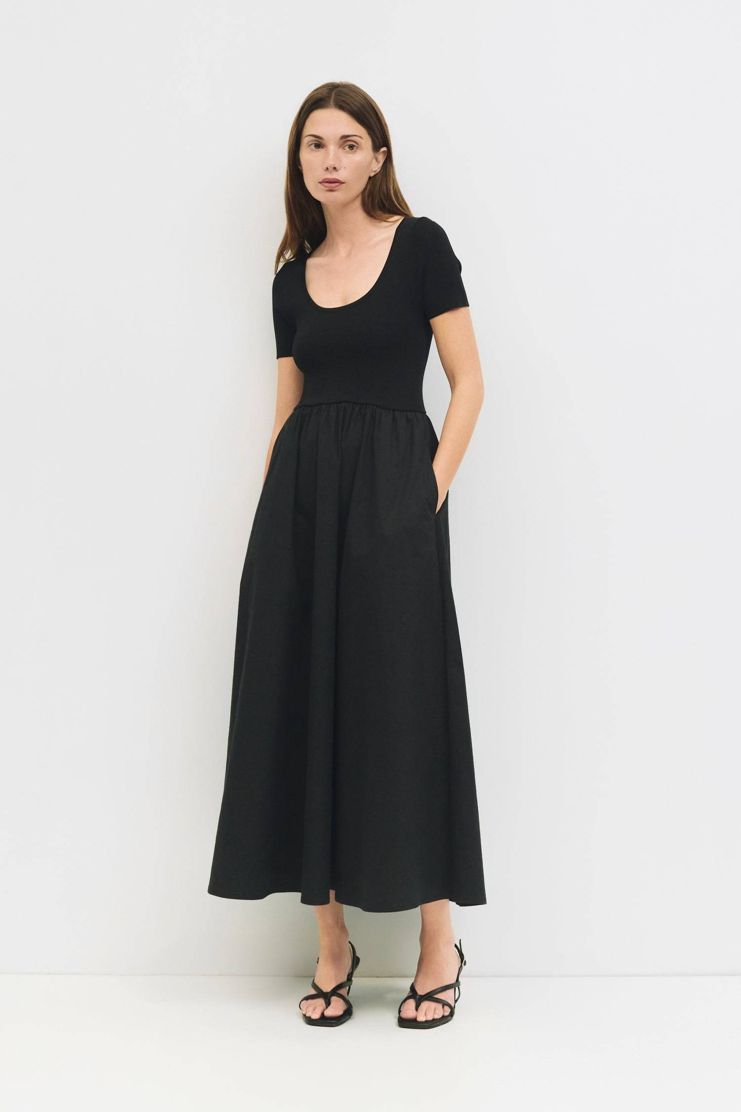9084439199965, The Lynette Dress, Dress, Mod Ref, Black,Blue,brown,cf-color-black,cf-color-blue,cf-color-brown,cf-size-l,cf-vendor-all-row,Comfort,Comfortable,dark brown,Feminine,fit and flare,Fitted Top,full skirt,Midi,Midi Dress,midi length,new,Scoop Neckline,scooped neckline,Spring,Womens, Information The Lynette Dress combines a form-fitting scoop-neck knit top with a lightweight, full maxi skirt. Shirring at the waistband and a side zipper create a flattering silhouette with effortless movement. Detail