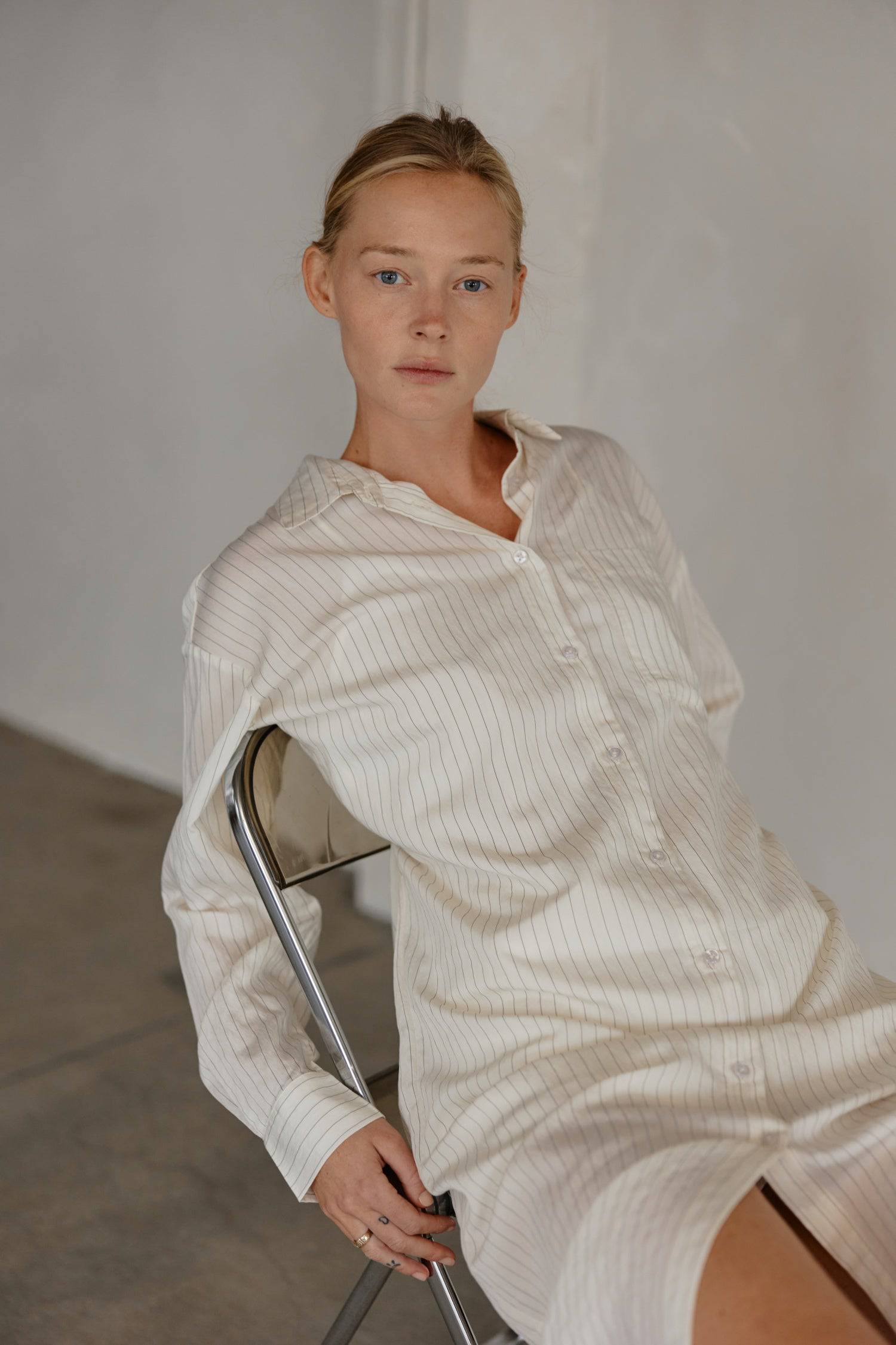 8364403556573, The Jill Dress, Dress, Mod Ref, Button down,button down dress,cf-color-ivory,cf-color-navy,cf-size-l,cf-size-m,cf-size-s,cf-vendor-mod-ref,Comfort,Comfortable,Comfy,Dress,everyday,final-sale,finalsale,ivory,Lining,Mid Length Dress,Midi,Midi Dress,Navy,new,Pinstriped,Pinstripes,Relaxed Fit,sale,Semi-Sheer,Sheer,Short Sleeve Dress,Summer,white,womens, Information Introducing The Jill Dress, a pinstripe design button-down midi dress. Crafted from a breathable semi-transparent fabric, it comes wi