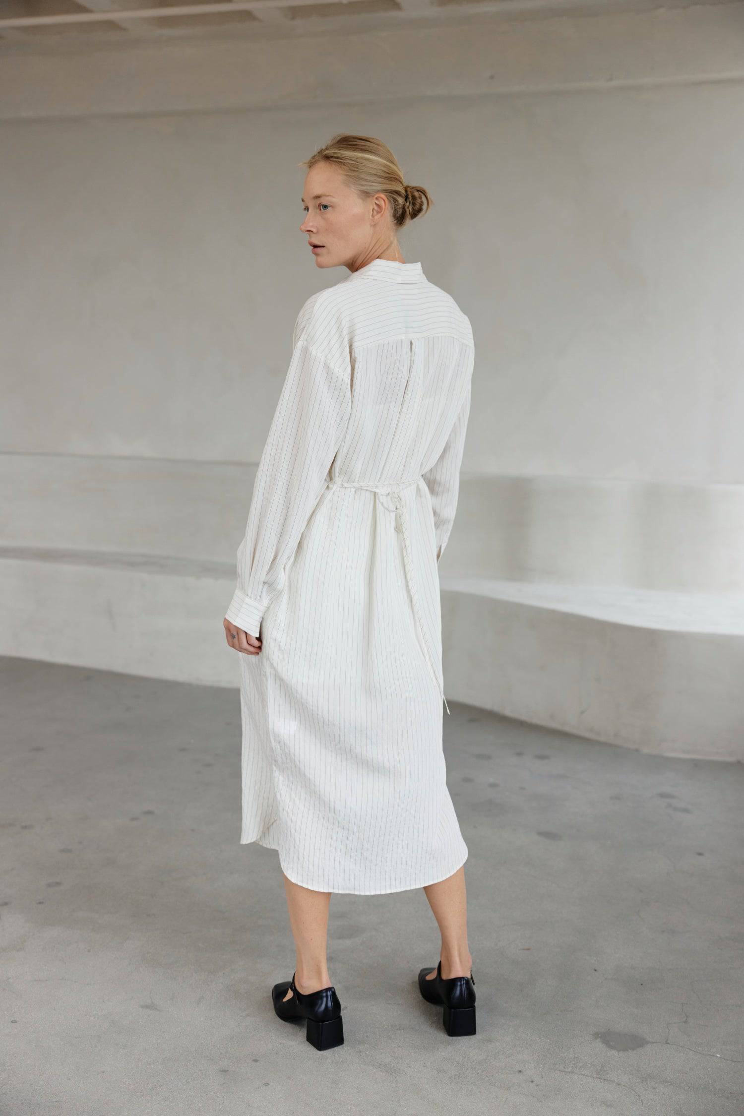 8364403556573, The Jill Dress, Dress, Mod Ref, Button down,button down dress,cf-color-ivory,cf-color-navy,cf-size-l,cf-size-m,cf-size-s,cf-vendor-mod-ref,Comfort,Comfortable,Comfy,Dress,everyday,final-sale,finalsale,ivory,Lining,Mid Length Dress,Midi,Midi Dress,Navy,new,Pinstriped,Pinstripes,Relaxed Fit,sale,Semi-Sheer,Sheer,Short Sleeve Dress,Summer,white,womens, Information Introducing The Jill Dress, a pinstripe design button-down midi dress. Crafted from a breathable semi-transparent fabric, it comes wi