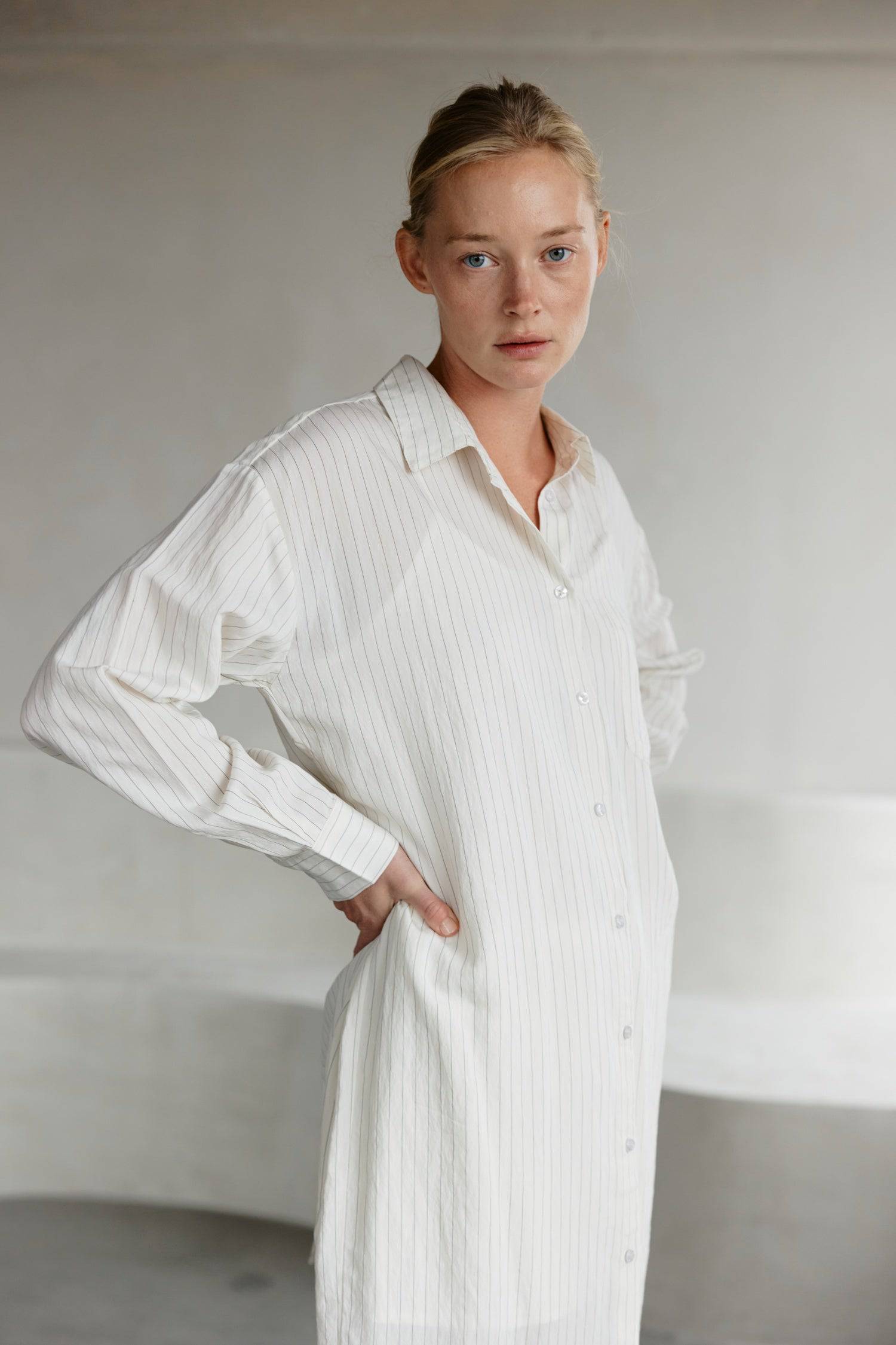 8364403556573, The Jill Dress, Dress, Mod Ref, Button down,button down dress,cf-color-ivory,cf-color-navy,cf-size-l,cf-size-m,cf-size-s,cf-vendor-mod-ref,Comfort,Comfortable,Comfy,Dress,everyday,final-sale,finalsale,ivory,Lining,Mid Length Dress,Midi,Midi Dress,Navy,new,Pinstriped,Pinstripes,Relaxed Fit,sale,Semi-Sheer,Sheer,Short Sleeve Dress,Summer,white,womens, Information Introducing The Jill Dress, a pinstripe design button-down midi dress. Crafted from a breathable semi-transparent fabric, it comes wi