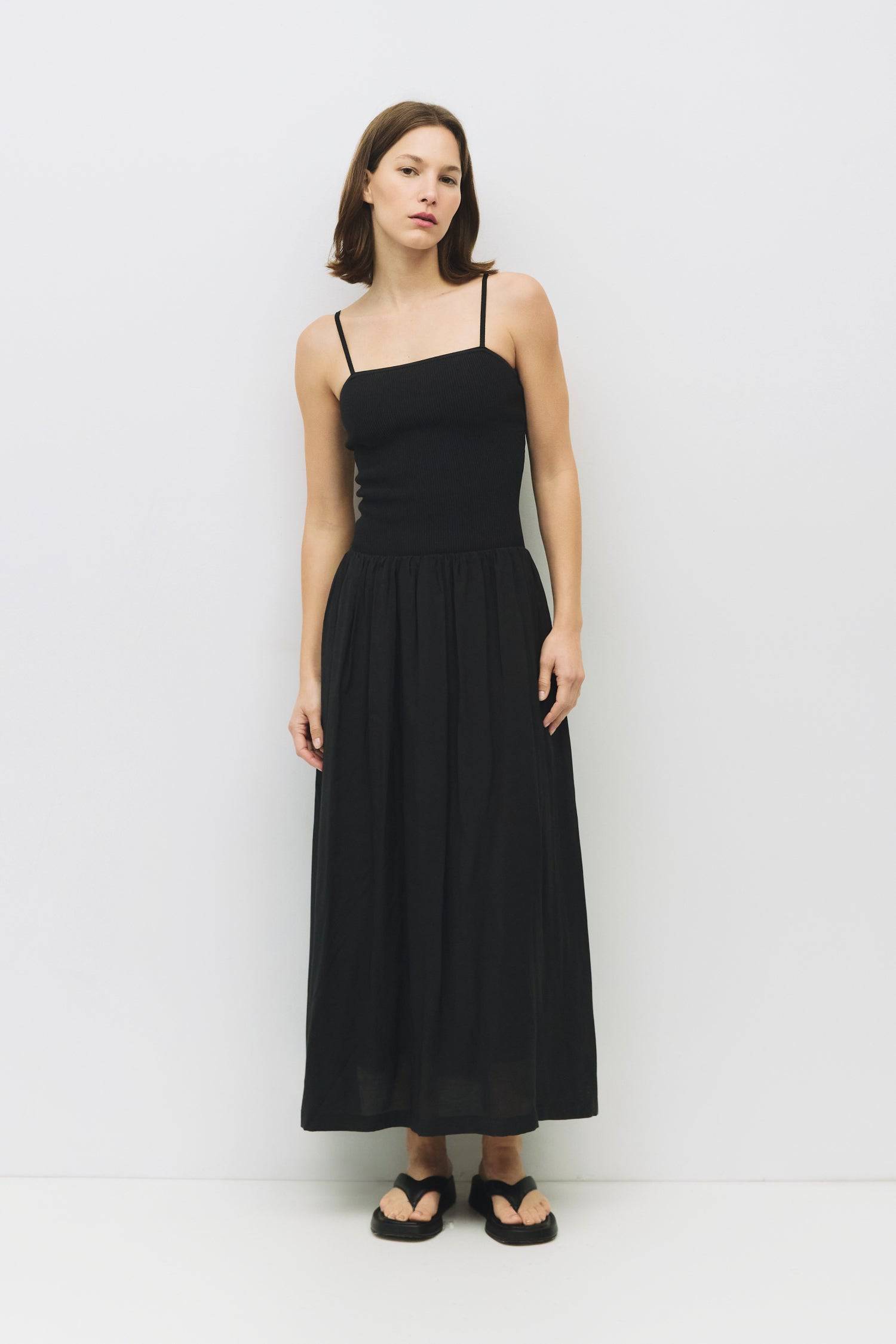 8983746511069, The Hudson Dress, Dress, Mod Ref, Black,Casual,cf-color-black,cf-color-red,cf-color-white,cf-size-l,cf-vendor-all-row,collared,Comfort,Comfortable,Feminine,full skirt,Midi,Midi Dress,midi length,new,Red,Sleeveless,Sleeveless Dress,Spring,versatile,white,Womens, Information The Hudson Dress is a flattering midi tube dress with a ribbed knit top and adjustable straps. The fully lined woven skirt adds a touch of sophistication, making it a go-to piece that transitions seamlessly from day to nigh