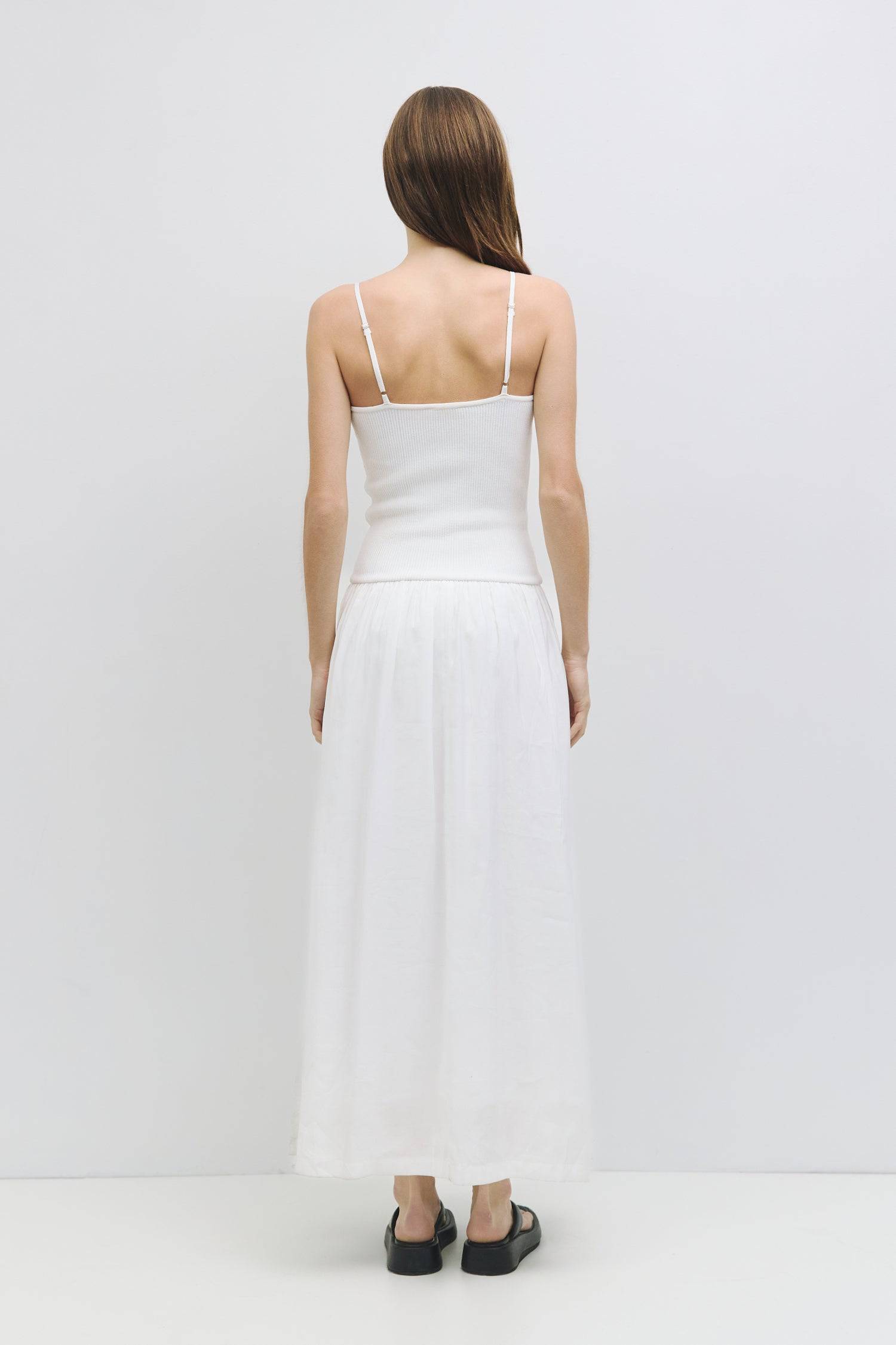 8983746511069, The Hudson Dress, Dress, Mod Ref, Black,Casual,cf-color-black,cf-color-red,cf-color-white,cf-size-l,cf-vendor-all-row,collared,Comfort,Comfortable,Feminine,full skirt,Midi,Midi Dress,midi length,new,Red,Sleeveless,Sleeveless Dress,Spring,versatile,white,Womens, Information The Hudson Dress is a flattering midi tube dress with a ribbed knit top and adjustable straps. The fully lined woven skirt adds a touch of sophistication, making it a go-to piece that transitions seamlessly from day to nigh