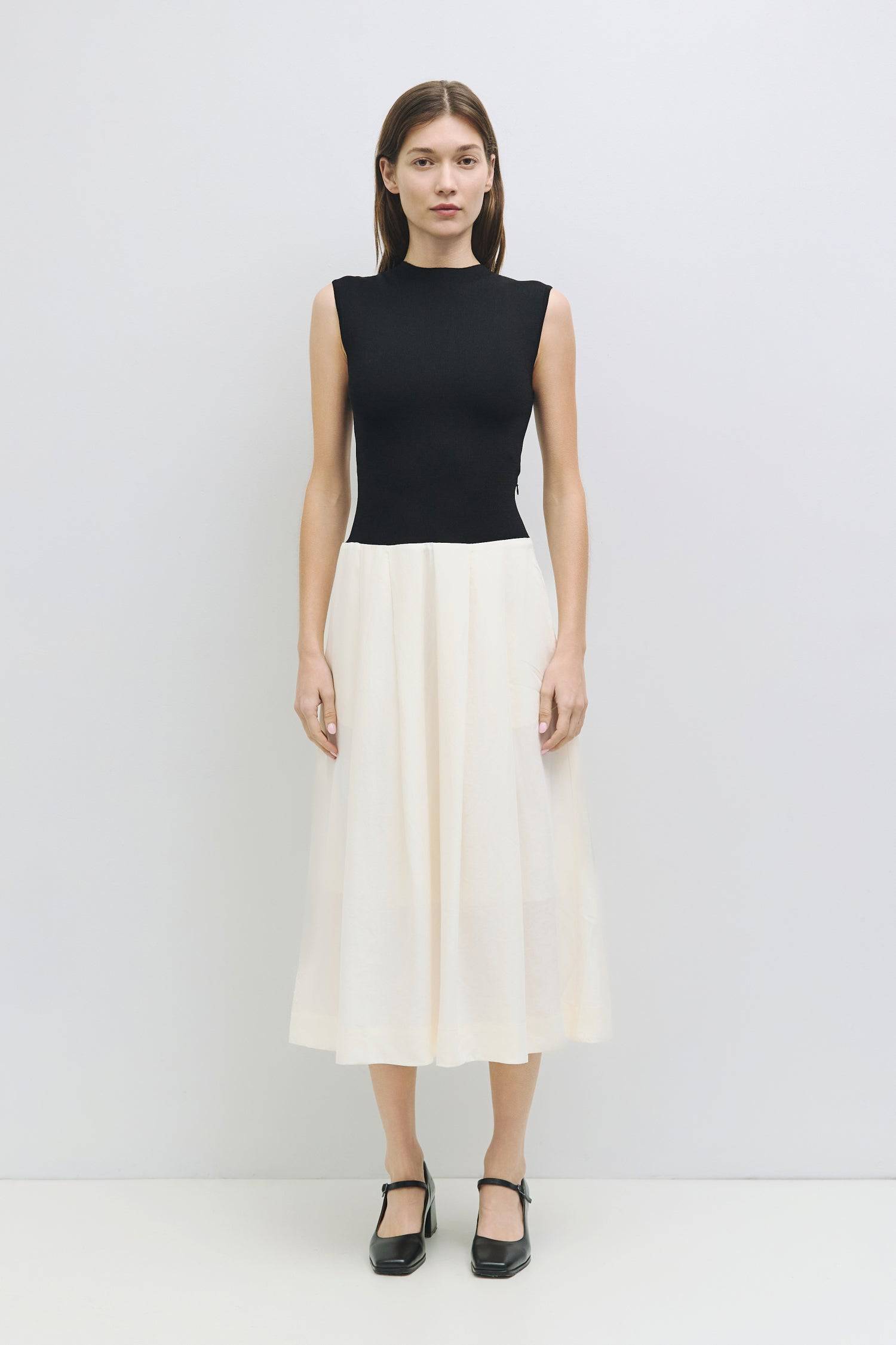 8911003779293, The Cairo Dress, Dress, Mod Ref, Black,Casual,cf-color-black,cf-color-khaki,cf-color-white,cf-size-l,cf-size-m,cf-size-s,cf-vendor-mod-ref,Cinched Waist,Color Block,Comfortable,corset,Dress,dressy,Form Fitting,Long Dress,maxi dress,Mid Length Dress,Midi,Midi Dress,midi length,new,Pleated,pleated skirt,pleating,Pleats,Pocket,Pockets,Relaxed Fit,side pockets,Spring,square,Summer,white,womens, Information The Cairo Dress combines a high gauge knit top with a fully lined, pleated skirt for a stri