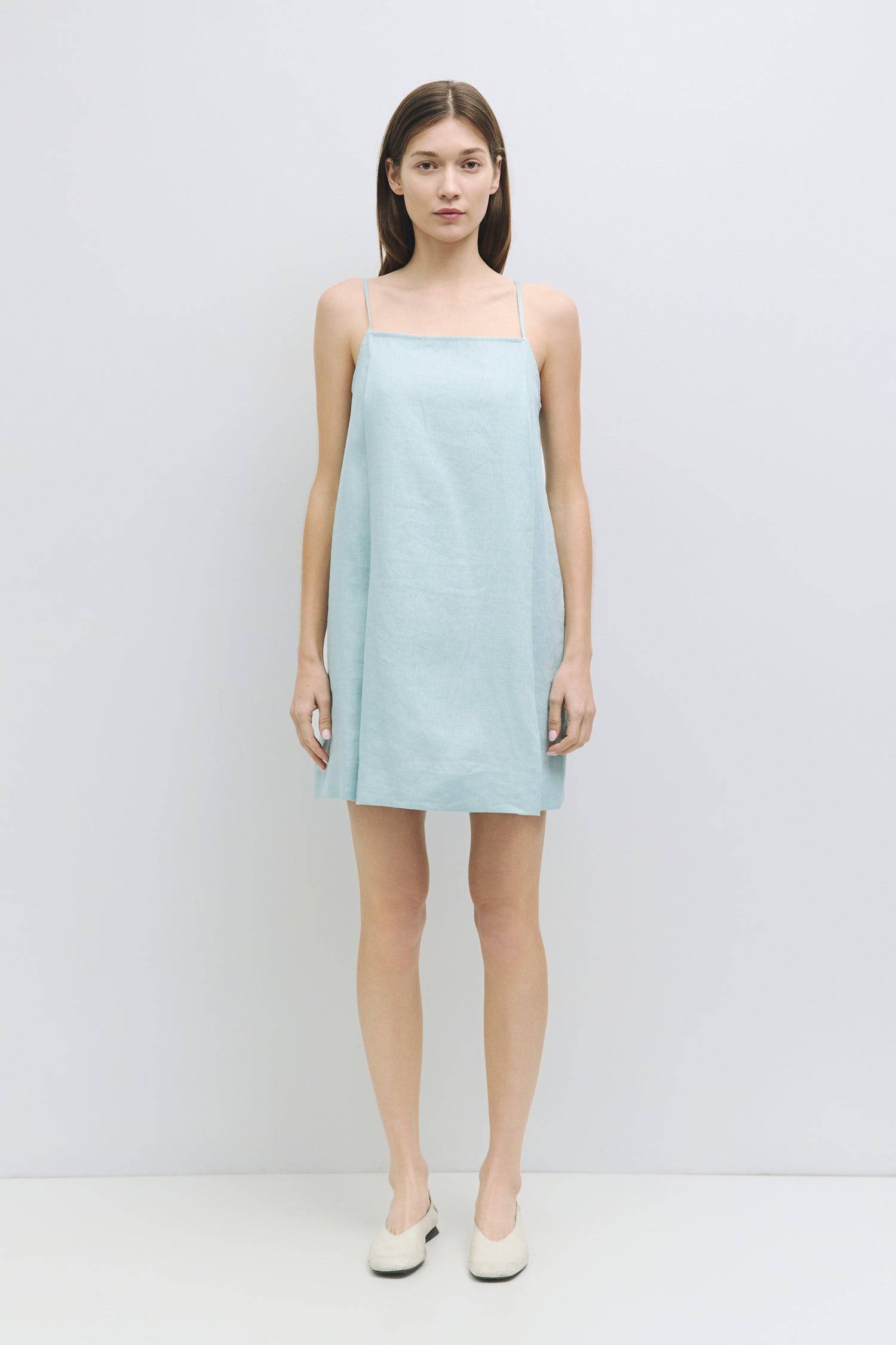 8931227402461, The Andie Dress, Dress, Mod Ref, a line,adjustable straps,babydoll,Casual,cf-size-l,cf-size-m,cf-size-s,Comfortable,drape,everyday,Feminine,lined,Linen,linen-blend,Mini Dress,new,Semi-Formal,Slip,Spaghetti straps,Square Neckline,Squared Neckline,womens, Information The Andie Dress is a mini dress made from 100% linen, featuring adjustable spaghetti straps and a square neckline. With its loose fit and back zipper closure, it's fully lined for added comfort and style. Details Self: 100% Linen L