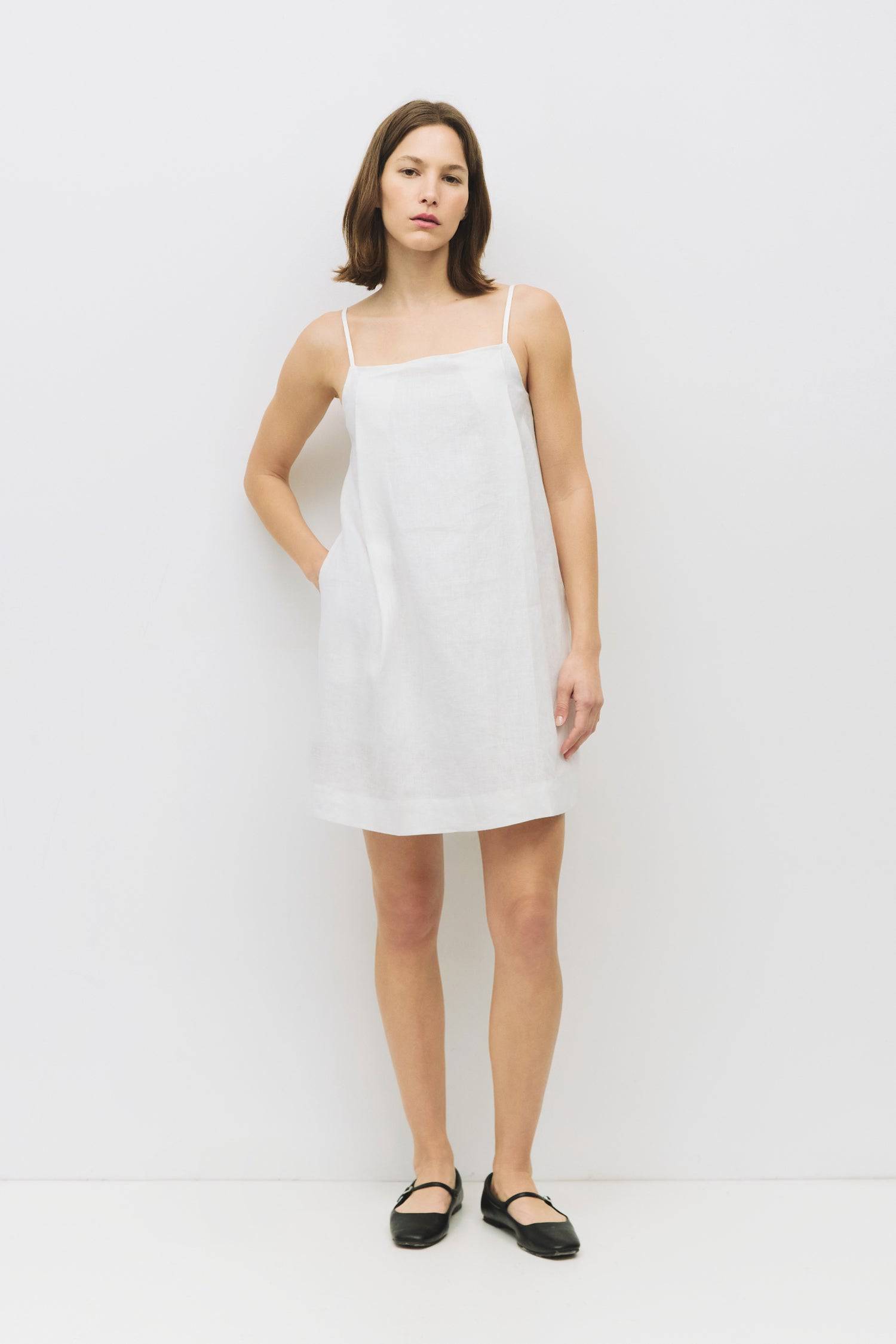 8931227402461, The Andie Dress, Dress, Mod Ref, a line,adjustable straps,babydoll,Casual,cf-size-l,cf-size-m,cf-size-s,Comfortable,drape,everyday,Feminine,lined,Linen,linen-blend,Mini Dress,new,Semi-Formal,Slip,Spaghetti straps,Square Neckline,Squared Neckline,womens, Information The Andie Dress is a mini dress made from 100% linen, featuring adjustable spaghetti straps and a square neckline. With its loose fit and back zipper closure, it's fully lined for added comfort and style. Details Self: 100% Linen L