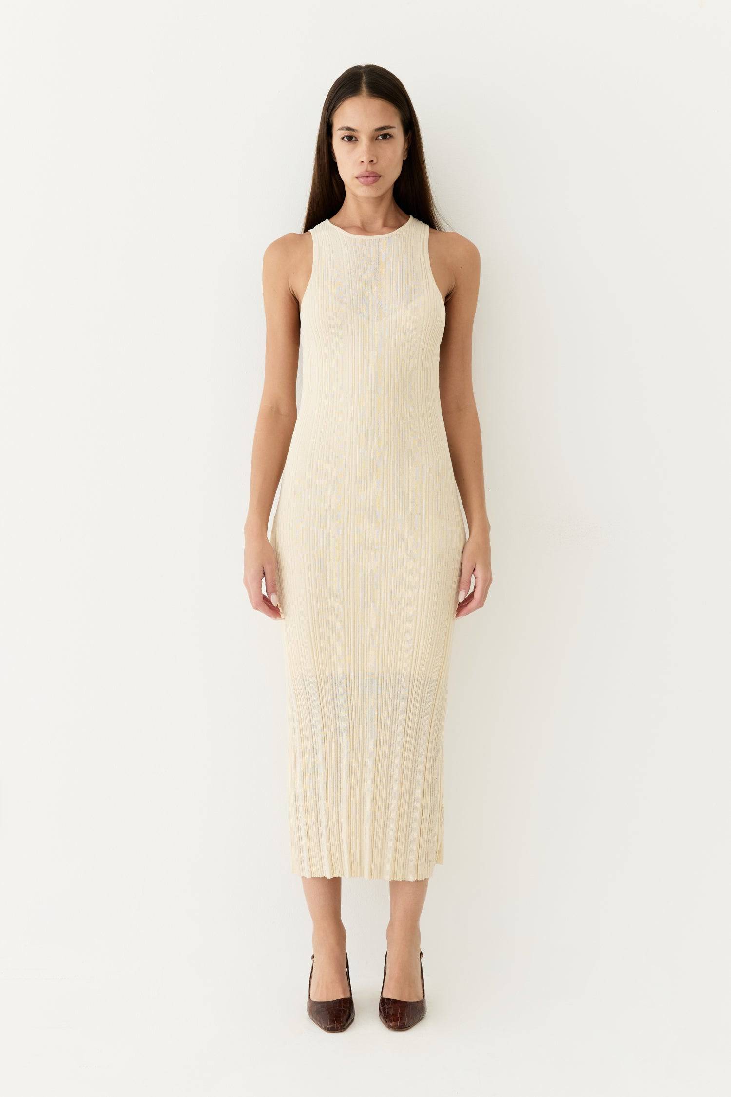 8954054705373, The Trinity Dress, Dress, Mod Ref, Black,Casual,cf-color-black,cf-color-cream,cf-color-khaki,cf-color-white,cf-size-l,cf-size-m,cf-size-s,cf-vendor-mod-ref,Cinched Waist,Color Block,Comfortable,corset,Cream,Dress,dressy,Form Fitting,Long Dress,maxi dress,Mid Length Dress,Midi,Midi Dress,midi length,new,Pleated,pleating,Pleats,Pocket,Relaxed Fit,side pockets,Spring,square,Summer,womens, Information The Trinity Dress fuses sheer ribbed knitting with a round neckline and sleeveless design for a