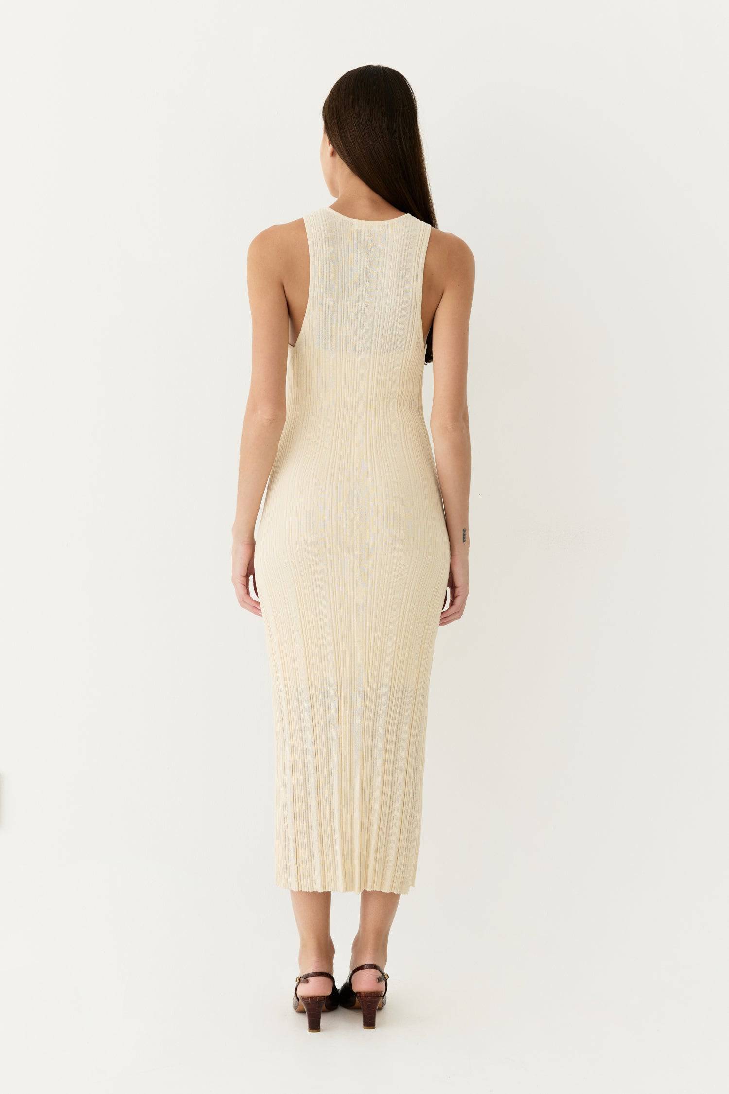 8954054705373, The Trinity Dress, Dress, Mod Ref, Black,Casual,cf-color-black,cf-color-cream,cf-color-khaki,cf-color-white,cf-size-l,cf-size-m,cf-size-s,cf-vendor-mod-ref,Cinched Waist,Color Block,Comfortable,corset,Cream,Dress,dressy,Form Fitting,Long Dress,maxi dress,Mid Length Dress,Midi,Midi Dress,midi length,new,Pleated,pleating,Pleats,Pocket,Relaxed Fit,side pockets,Spring,square,Summer,womens, Information The Trinity Dress fuses sheer ribbed knitting with a round neckline and sleeveless design for a