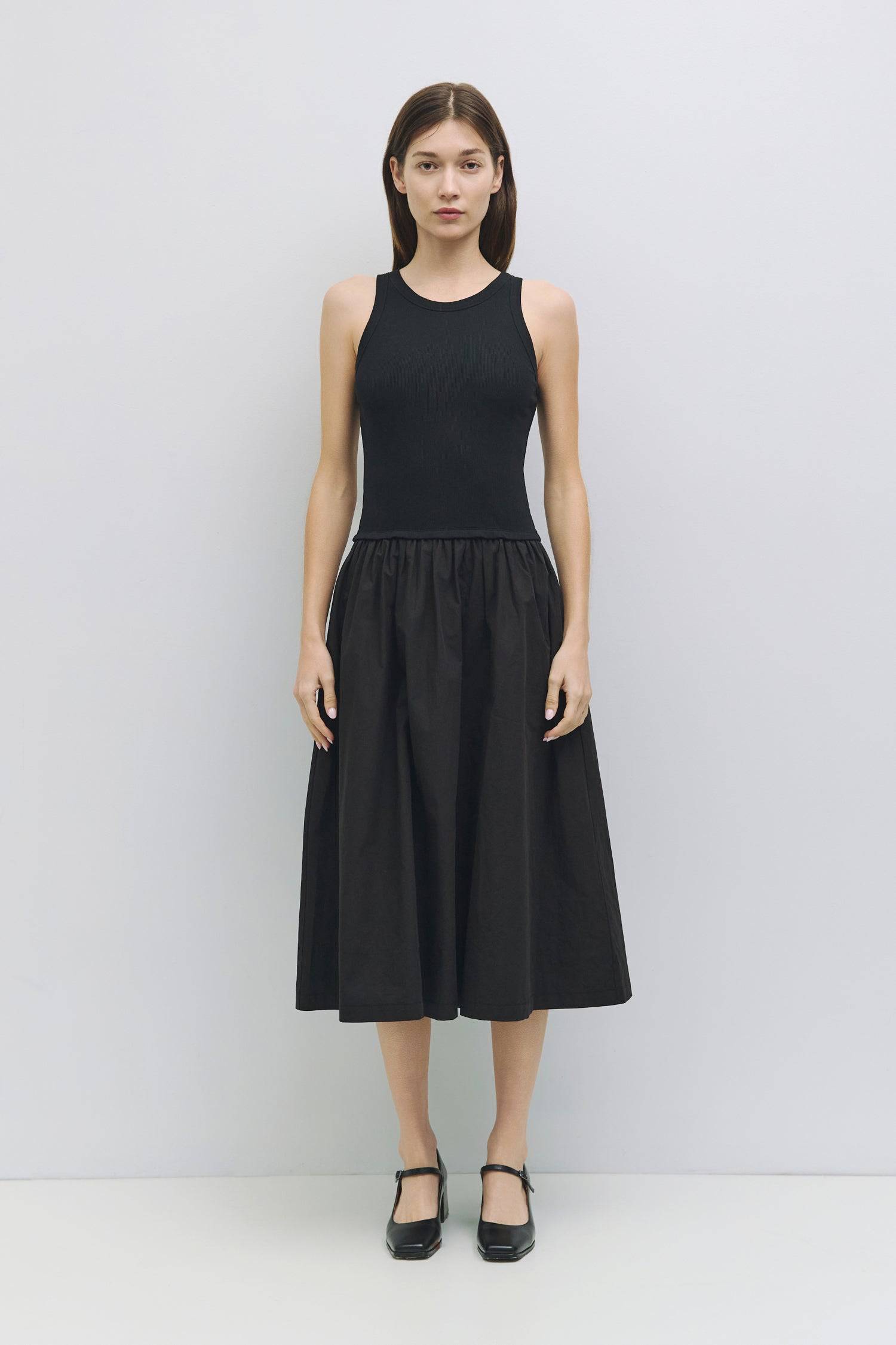 8919177265373, The Claire Dress, Dress, Mod Ref, Casual,cf-color-black,cf-color-cream,cf-color-white,cf-size-l,cf-size-m,cf-size-s,cf-vendor-mod-ref,Cinched Waist,Comfortable,Cotton,Cream,curve skirt,drawstring waist,Dress,dressy,Everyday,Long Dress,maxi dress,Mid Length Dress,Midi,Midi Dress,midi length,new,side pockets,Sleeveless,Spring,Summer,voluminous,womens, Information The Claire Dress offers a chic 2-in-1 design with a ribbed knit tank top, featuring binding details at the armholes and neckline for