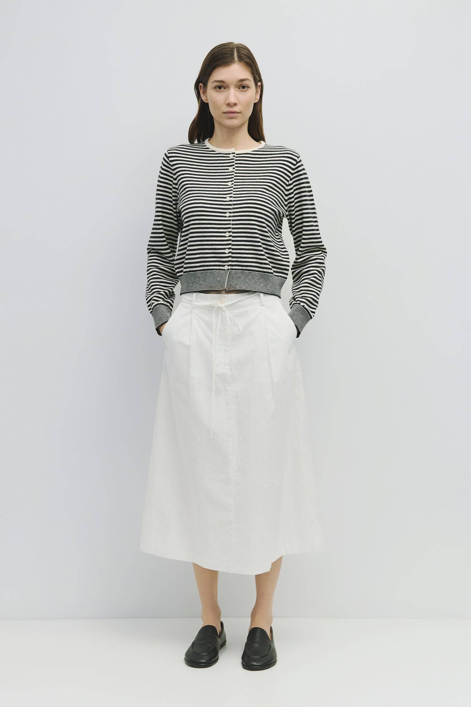 8982643540189, The Montana Cardigan, Tops, All Row, All Row,allrow,Basic,Basics,Black,black/white,Blue,Cardigan,Casual,cf-color-black,cf-color-cream,cf-color-navy,cf-color-red,cf-color-white-black,cf-size-l,cf-size-m,cf-size-s,Comfortable,Knit,Light Blue,Lightweight,Navy,new,Red,Short Sleeve,Spring,stretch,Striped,Transitional,Womens,womens top, Information The Montana Cardigan is a lightweight, long-sleeve stripe knit cardigan with a relaxed fit, button-down closure, and a subtle front bottom slit. Details