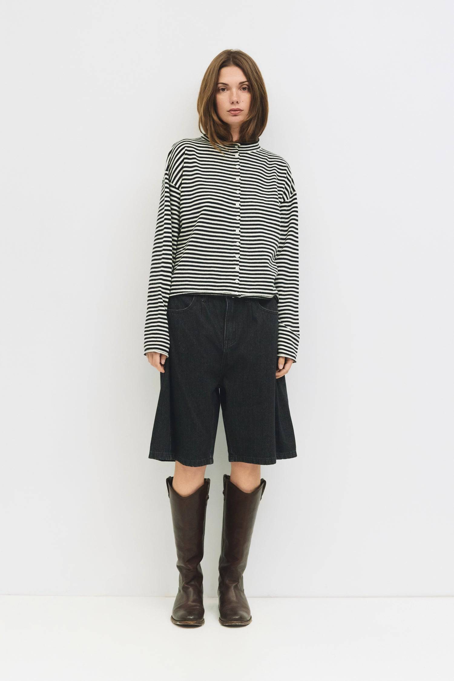 9023676514525, The Elisa Cardigan, Tops, All Row, All Row,allrow,Basic,Basics,Black,black/white,Blue,brown,Cardigan,Casual,cf-color-black,cf-color-blue,cf-color-brown,cf-color-cream,cf-color-red,cf-color-white-black,cf-size-l,cf-size-m,cf-size-s,Comfortable,Knit,Lightweight,new,Red,rolled hem,Spring,stretch,Striped,Transitional,Vertical Stripes,Womens,womens top, Information The Elisa Cardigan is a striped button-up cardigan designed with a relaxed fit for everyday wear. Finished with rolled edges on the ne