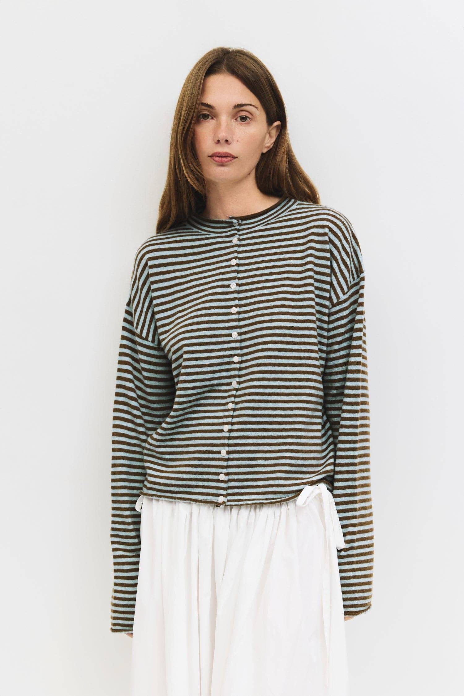 9023676514525, The Elisa Cardigan, Tops, All Row, All Row,allrow,Basic,Basics,Black,black/white,Blue,brown,Cardigan,Casual,cf-color-black,cf-color-blue,cf-color-brown,cf-color-cream,cf-color-red,cf-color-white-black,cf-size-l,cf-size-m,cf-size-s,Comfortable,Knit,Lightweight,new,Red,rolled hem,Spring,stretch,Striped,Transitional,Vertical Stripes,Womens,womens top, Information The Elisa Cardigan is a striped button-up cardigan designed with a relaxed fit for everyday wear. Finished with rolled edges on the ne