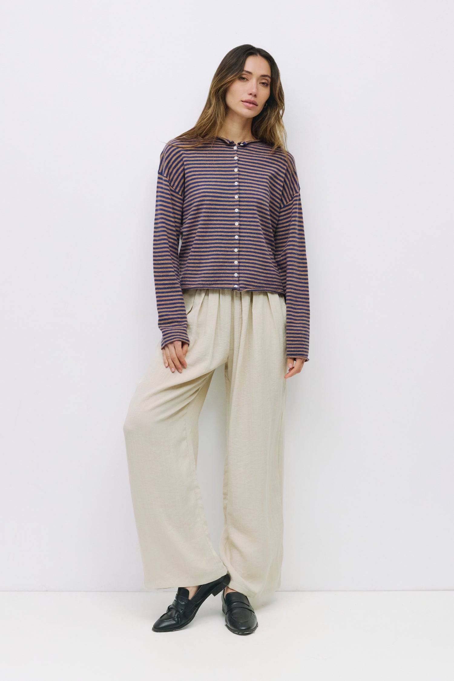 9023676514525, The Elisa Cardigan, Tops, All Row, All Row,allrow,Basic,Basics,Black,black/white,Blue,brown,Cardigan,Casual,cf-color-black,cf-color-blue,cf-color-brown,cf-color-cream,cf-color-red,cf-color-white-black,cf-size-l,cf-size-m,cf-size-s,Comfortable,Knit,Lightweight,new,Red,rolled hem,Spring,stretch,Striped,Transitional,Vertical Stripes,Womens,womens top, Information The Elisa Cardigan is a striped button-up cardigan designed with a relaxed fit for everyday wear. Finished with rolled edges on the ne