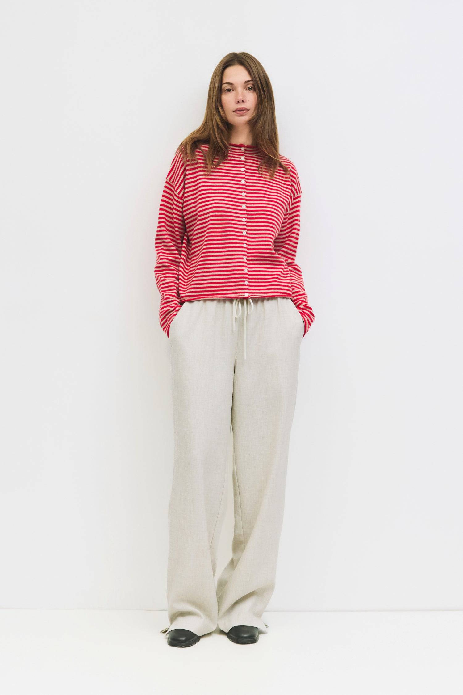 9023676514525, The Elisa Cardigan, Tops, All Row, All Row,allrow,Basic,Basics,Black,black/white,Blue,brown,Cardigan,Casual,cf-color-black,cf-color-blue,cf-color-brown,cf-color-cream,cf-color-red,cf-color-white-black,cf-size-l,cf-size-m,cf-size-s,Comfortable,Knit,Lightweight,new,Red,rolled hem,Spring,stretch,Striped,Transitional,Vertical Stripes,Womens,womens top, Information The Elisa Cardigan is a striped button-up cardigan designed with a relaxed fit for everyday wear. Finished with rolled edges on the ne