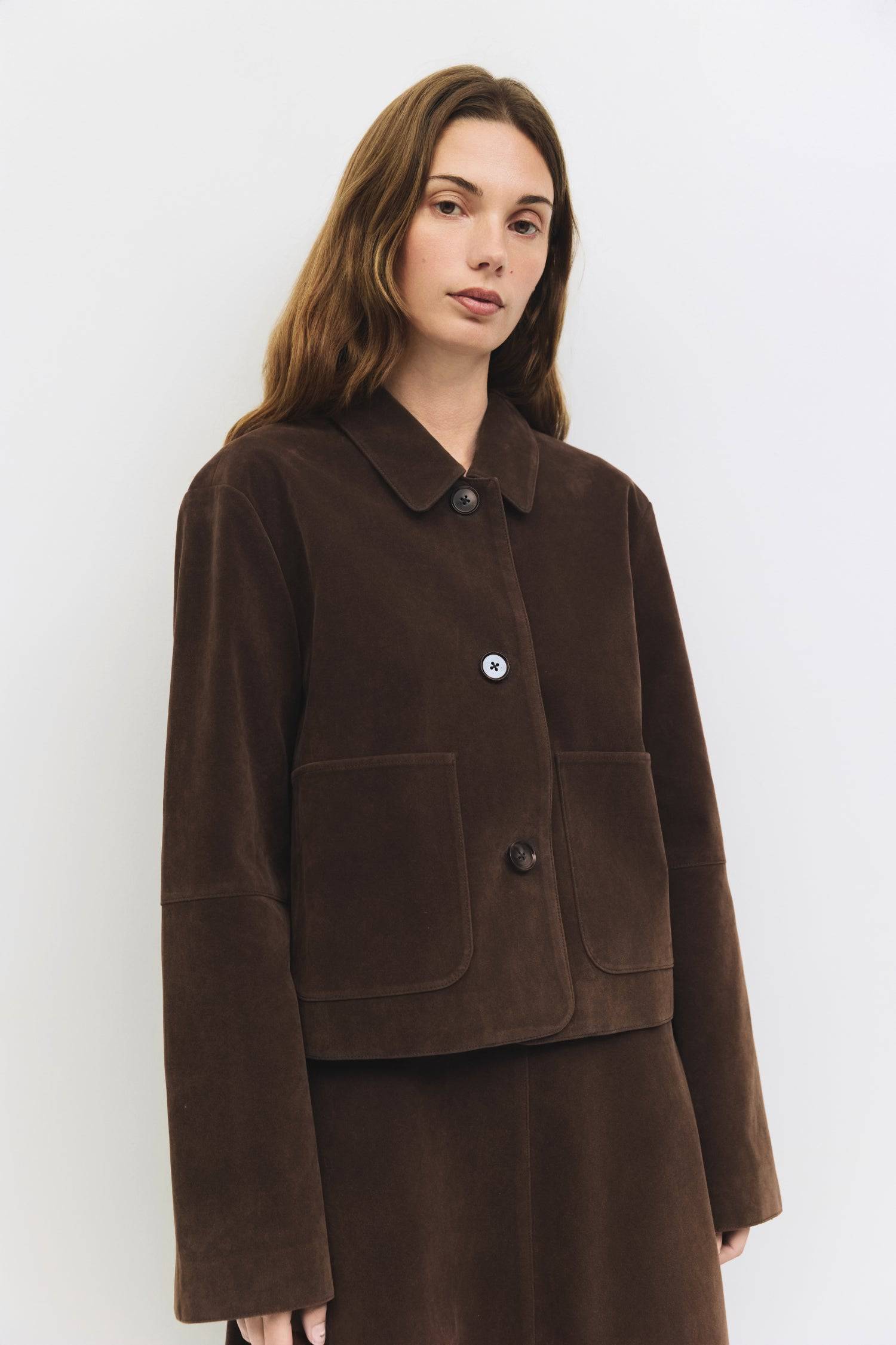 9084505620701, The Eryn Jacket, Outerwear, All Row, All Row,allrow,Back Detail,Black,Casual,cf-color-black,cf-size-l,cf-size-m,cf-vendor-all-row,Coat,Comfortable,Cropped,cropped hemline,Detail,Everyday,Faux Leather,genderless,Jacket,Leather,leather jacket,Minimal,minimalist,new,Outerwear,Pleather,Polyester,Semi-Formal,Spring,statement,statement piece,Transitional,vegan leather,versatile,Womens, Information The Eryn Jacket is a cropped suede piece with a relaxed fit, featuring a classic collar and front butt