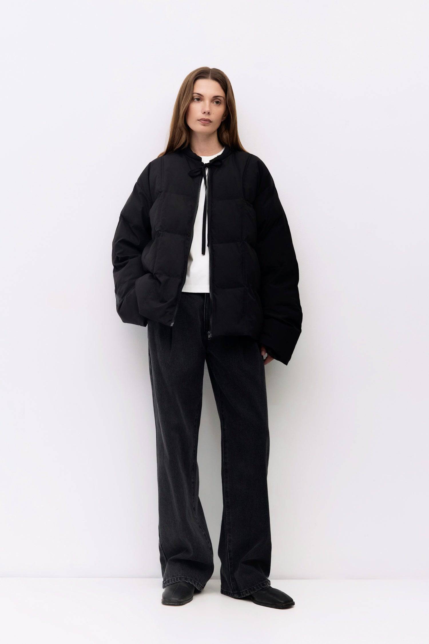 9084496347357, The Mila Jacket, Outerwear, All Row, All Row,allrow,Back Detail,Black,Casual,cf-color-black,cf-size-l,cf-size-m,cf-vendor-all-row,Coat,Comfortable,Cropped,cropped hemline,Detail,Everyday,Faux Leather,genderless,Jacket,Leather,leather jacket,Minimal,minimalist,new,Outerwear,Pleather,Polyester,Semi-Formal,Spring,statement,statement piece,Transitional,vegan leather,versatile,Womens,womens top, Information The Mila Jacket is a fully lined puffer style with quilted padding for added warmth. Design
